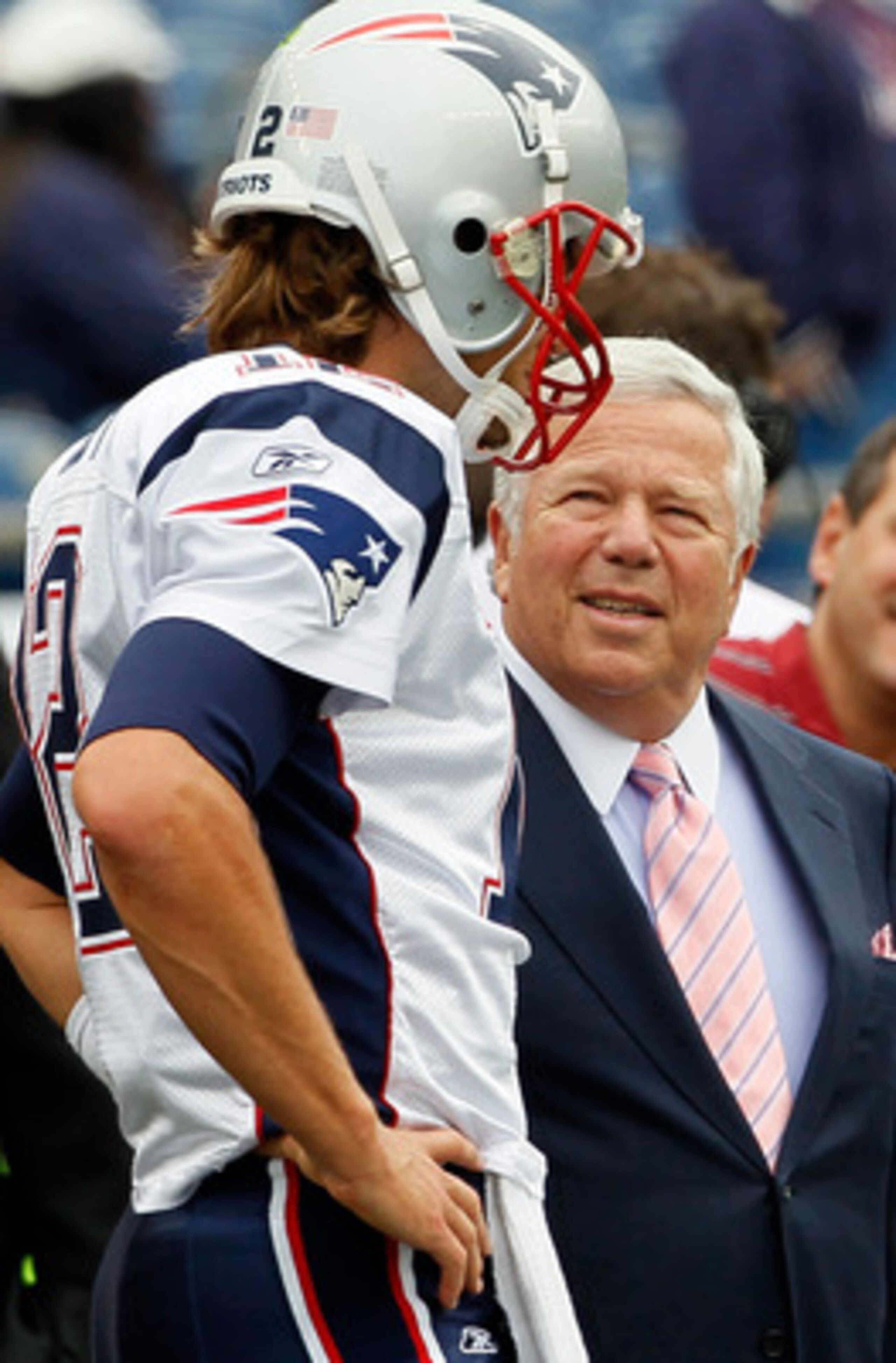FOXBORO, MA - SEPTEMBER 12: Quarterback Tom Brady #12 of the New England Patriots chats with owner Robert Kraft before the NFL season opener against the Cincinnati Bengals at Gillette Stadium on September 12, 2010 in Foxboro, Massachusetts. (Photo by Jim