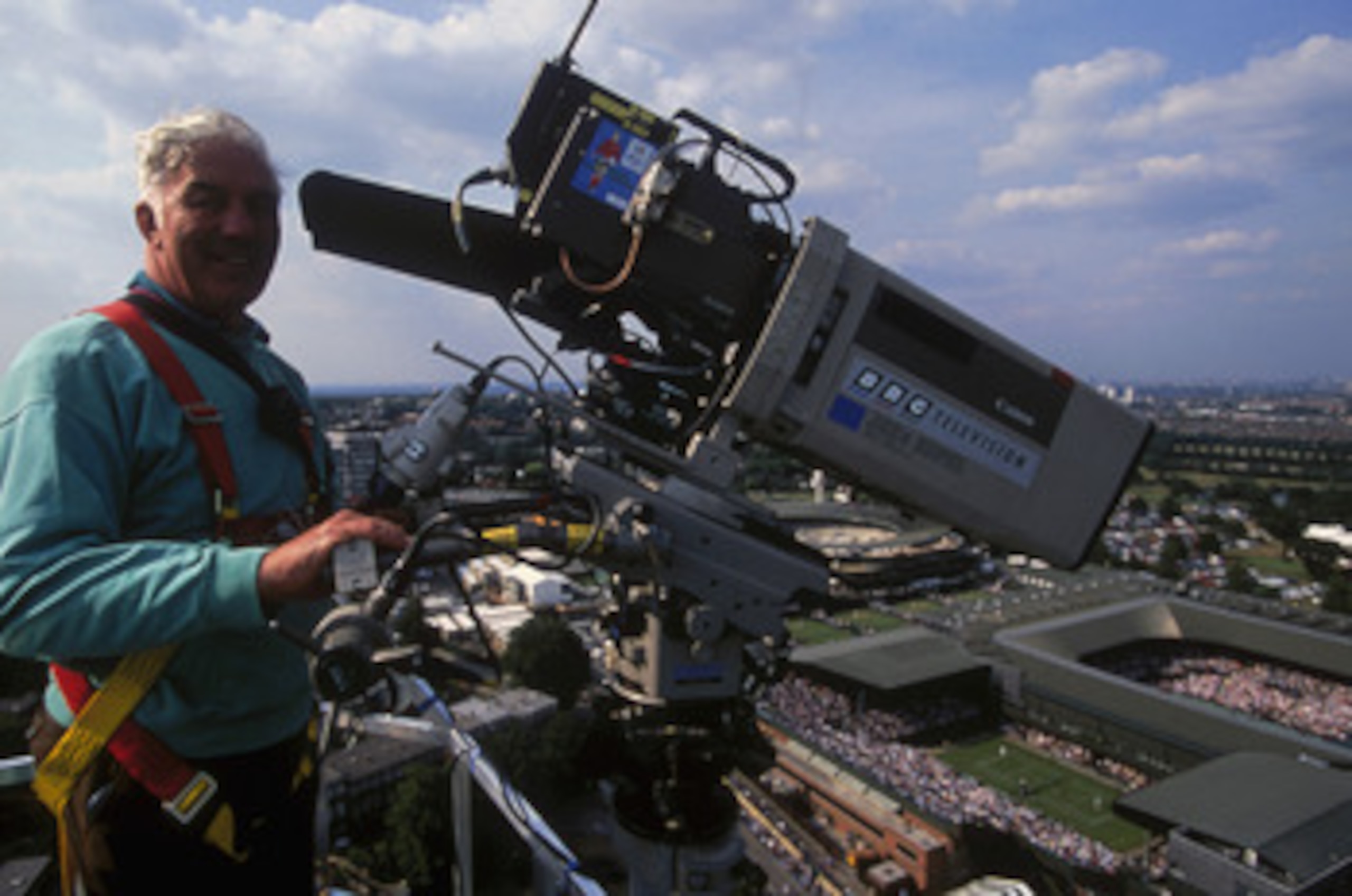 LONDON - JUNE 29:  A BBC cameraman on a skylift crane taken during the Wimbledon Lawn Tennis Championships held on June 29, 1996 at the All England Lawn Tennis and Croquet Club in London. (Photo by Mark Thompson/Getty Images)