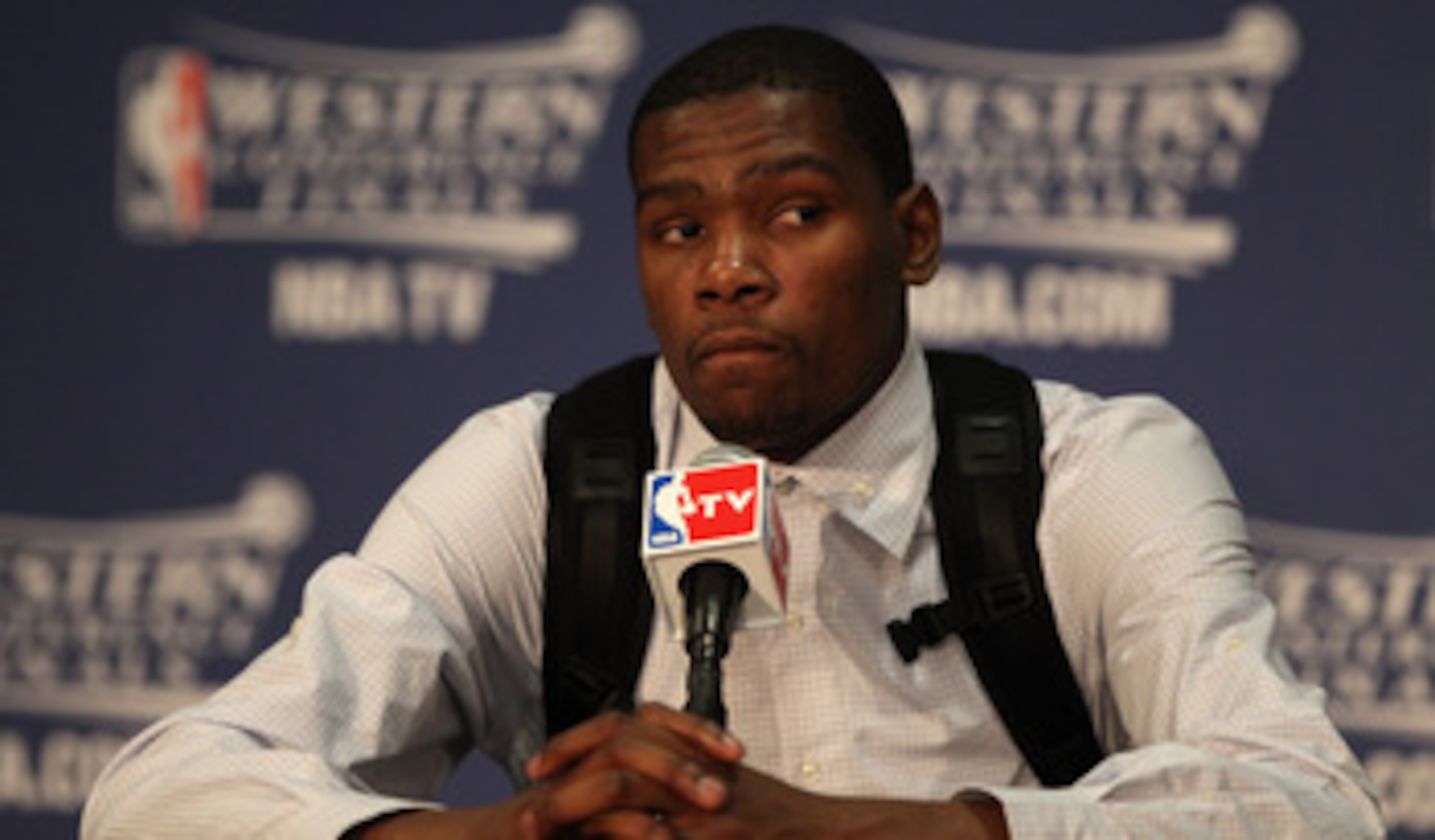 OKLAHOMA CITY, OK - MAY 23: Kevin Durant #35 of the Oklahoma City Thunder addresses the media after the Dallas Mavericks defeated the Thunder 112-105 in overtime in Game Four of the Western Conference Finals during the 2011 NBA Playoffs at Oklahoma City OKLAHOMA CITY, OK - MAY 23: Kevin Durant #35 of the Oklahoma City Thunder addresses the media after the Dallas Mavericks defeated the Thunder 112-105 in overtime in Game Four of the Western Conference Finals during the 2011 NBA Playoffs at Oklahoma City