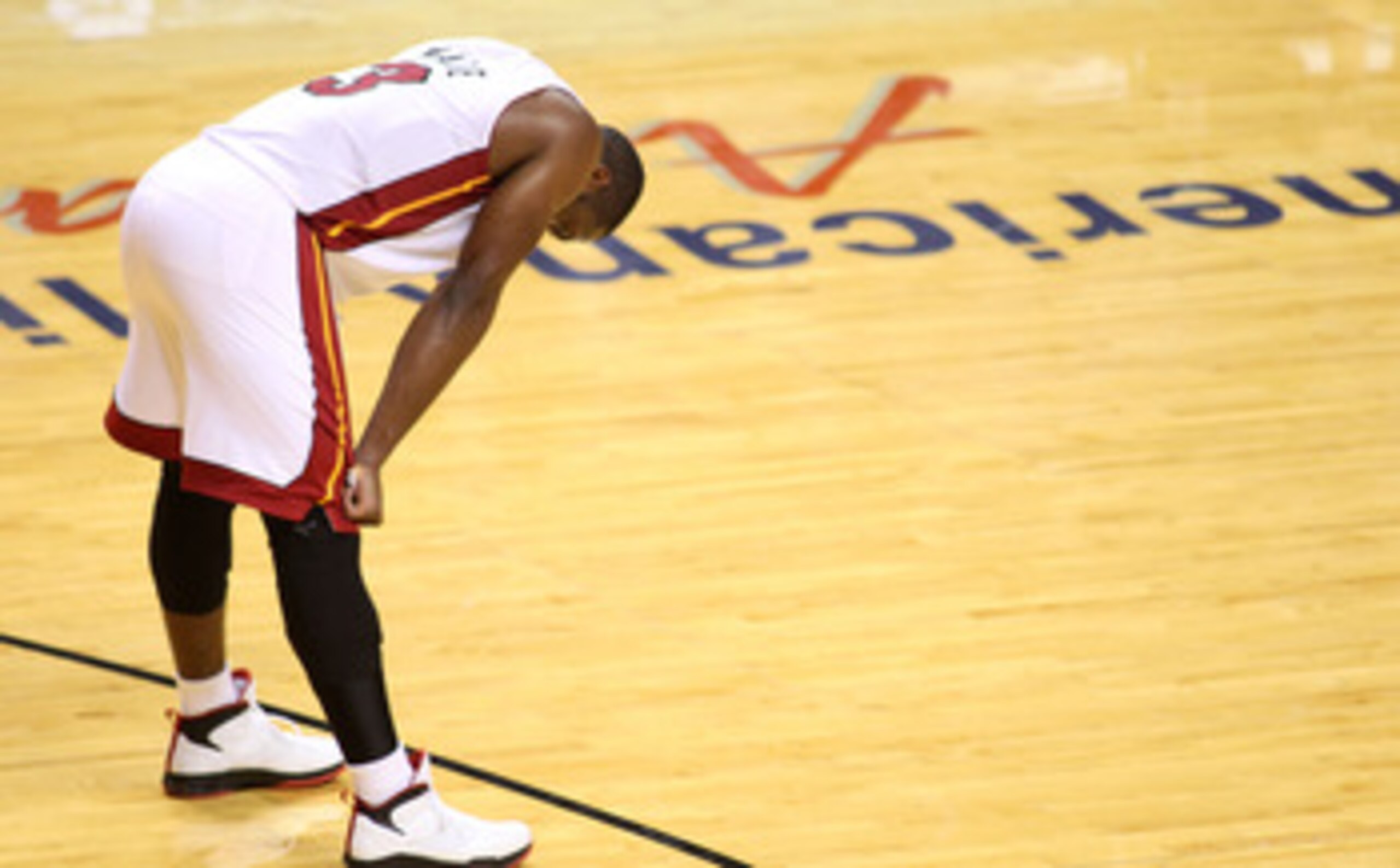 MIAMI, FL - JUNE 12: Dwyane Wade #3 of the Miami Heat stands on the court with his head down in the fourth quarter against the Dallas Mavericks in Game Six of the 2011 NBA Finals at American Airlines Arena on June 12, 2011 in Miami, Florida. NOTE TO USER MIAMI, FL - JUNE 12: Dwyane Wade #3 of the Miami Heat stands on the court with his head down in the fourth quarter against the Dallas Mavericks in Game Six of the 2011 NBA Finals at American Airlines Arena on June 12, 2011 in Miami, Florida. NOTE TO USER