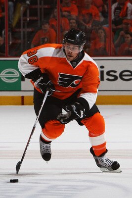 PHILADELPHIA, PA - APRIL 26:  Darroll Powe #36 of the Philadelphia Flyers controls the puck against the Buffalo Sabres in Game Seven of the Eastern Conference Quarterfinals during the 2011 NHL Stanley Cup Playoffs at Wells Fargo Center on April 26, 2011 i