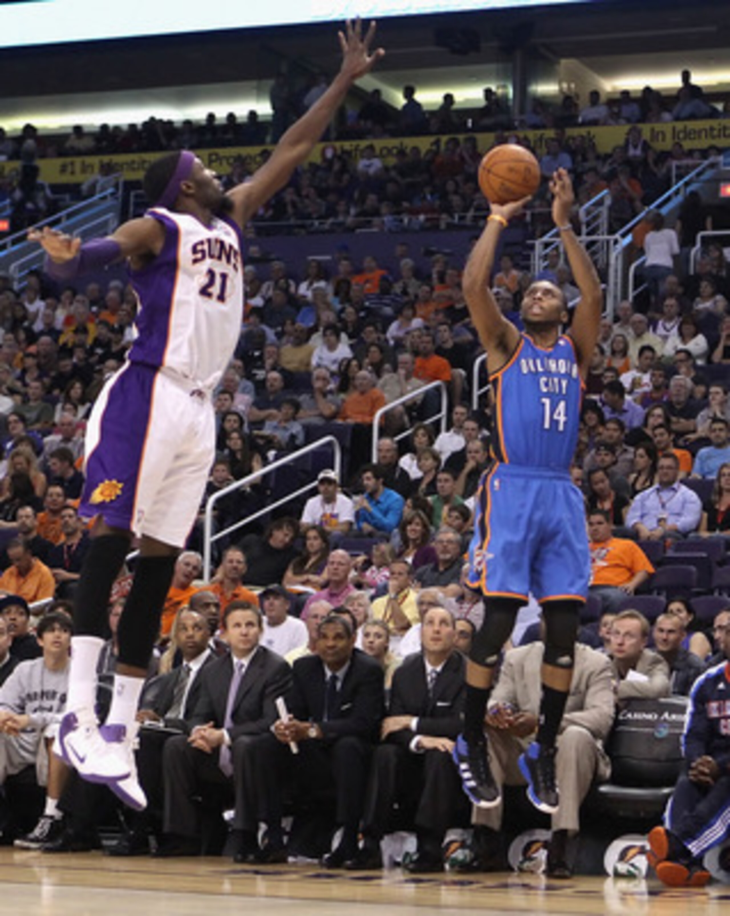 PHOENIX, AZ - MARCH 30: Daequan Cook #14 of the Oklahoma City Thunder puts up a shot during the NBA game against the Phoenix Suns at US Airways Center on March 30, 2011 in Phoenix, Arizona. The Thunder defeated the Suns 116-98. NOTE TO USER: User expre PHOENIX, AZ - MARCH 30: Daequan Cook #14 of the Oklahoma City Thunder puts up a shot during the NBA game against the Phoenix Suns at US Airways Center on March 30, 2011 in Phoenix, Arizona. The Thunder defeated the Suns 116-98. NOTE TO USER: User expre