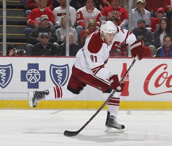 DETROIT, MI - APRIL 16: Kyle Turris #91 of the Phoenix Coyotes skates with the puck while playing the Detroit Red Wings in Game Two of the Western Conference Quarterfinals during the 2011 Stanley Cup Playoffs at Joe Louis Arena on April 16, 2011 in Detroi