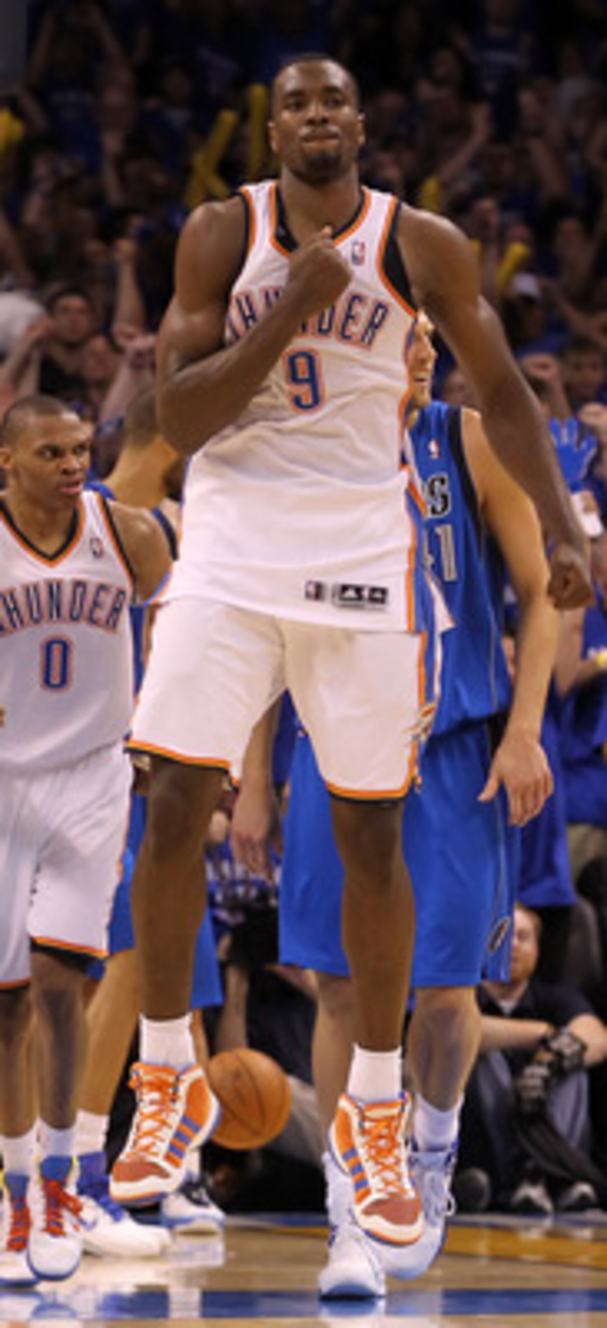 OKLAHOMA CITY, OK - MAY 23: Serge Ibaka #9 of the Oklahoma City Thunder reacts in the fourth quarter while taking on the Dallas Mavericks in Game Four of the Western Conference Finals during the 2011 NBA Playoffs at Oklahoma City Arena on May 23, 2011 in OKLAHOMA CITY, OK - MAY 23: Serge Ibaka #9 of the Oklahoma City Thunder reacts in the fourth quarter while taking on the Dallas Mavericks in Game Four of the Western Conference Finals during the 2011 NBA Playoffs at Oklahoma City Arena on May 23, 2011 in
