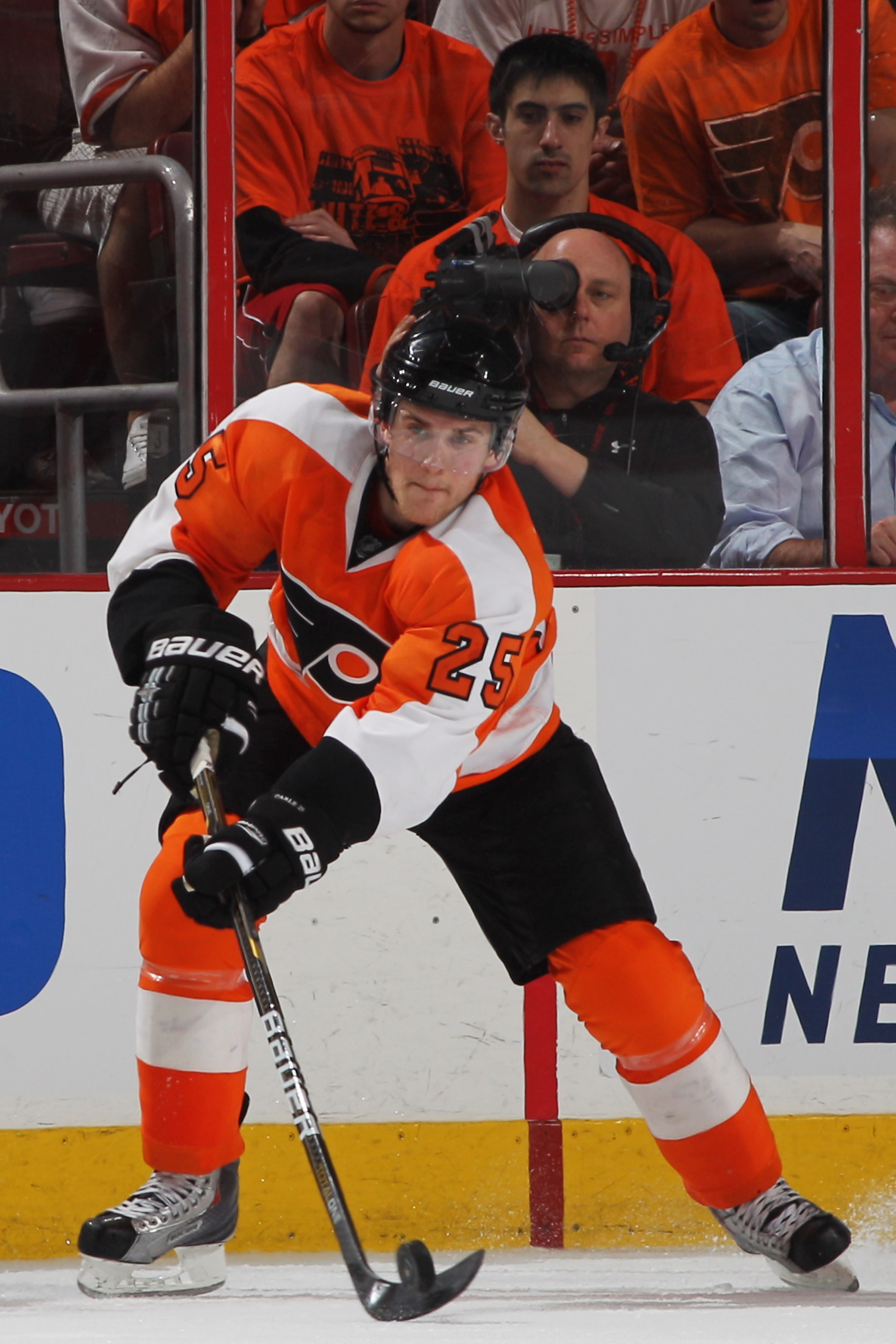 PHILADELPHIA, PA - APRIL 26:  Matt Carle #25 of the Philadelphia Flyers controls the puck against the Buffalo Sabres in Game Seven of the Eastern Conference Quarterfinals during the 2011 NHL Stanley Cup Playoffs at Wells Fargo Center on April 26, 2011 in