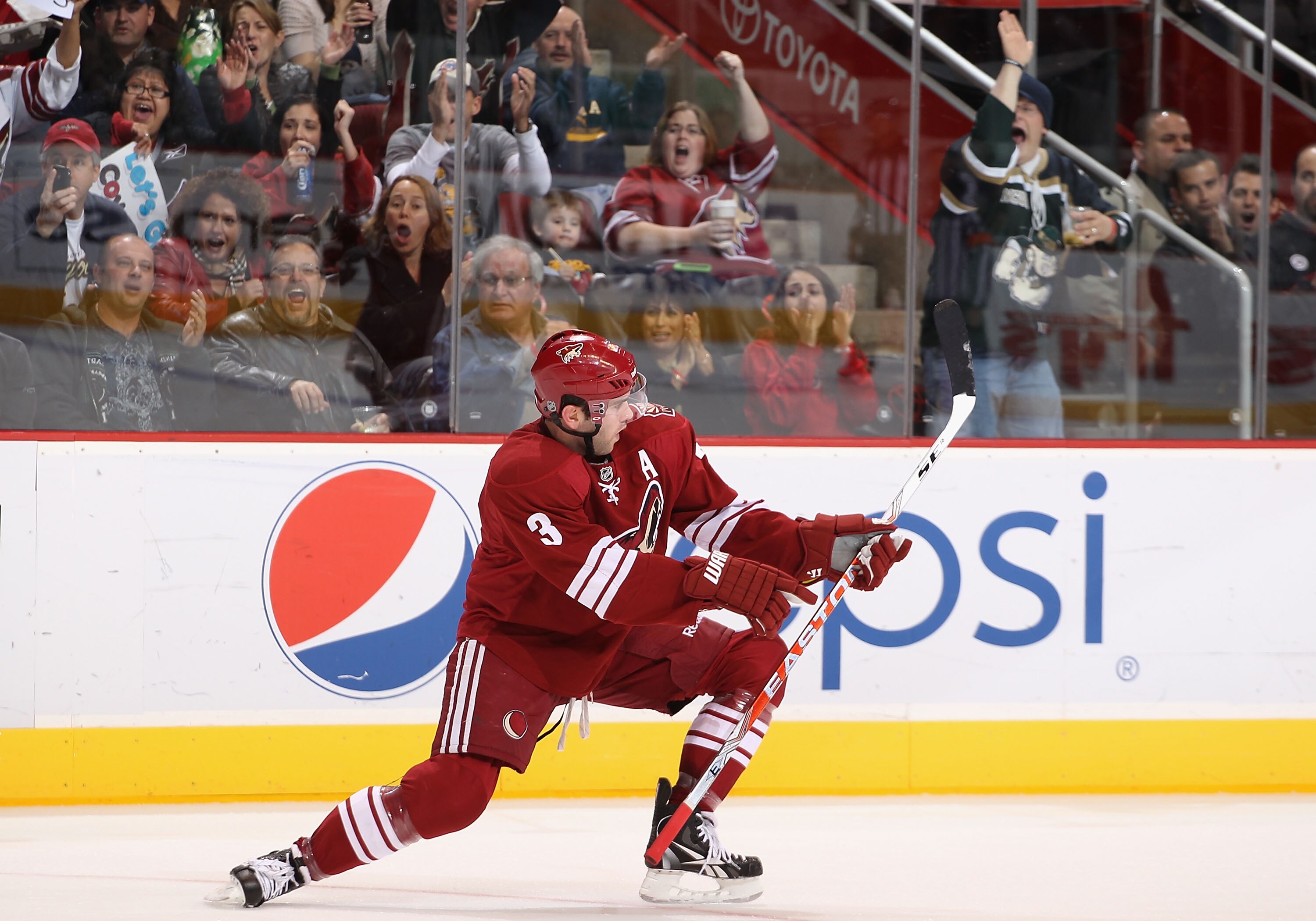 GLENDALE, AZ - NOVEMBER 27:  Keith Yandle #3 of the Phoenix Coyotes celebrates after scoring a second period goal against the Anaheim Ducks during the NHL game at Jobing.com Arena on November 27, 2010 in Glendale, Arizona.  (Photo by Christian Petersen/Ge