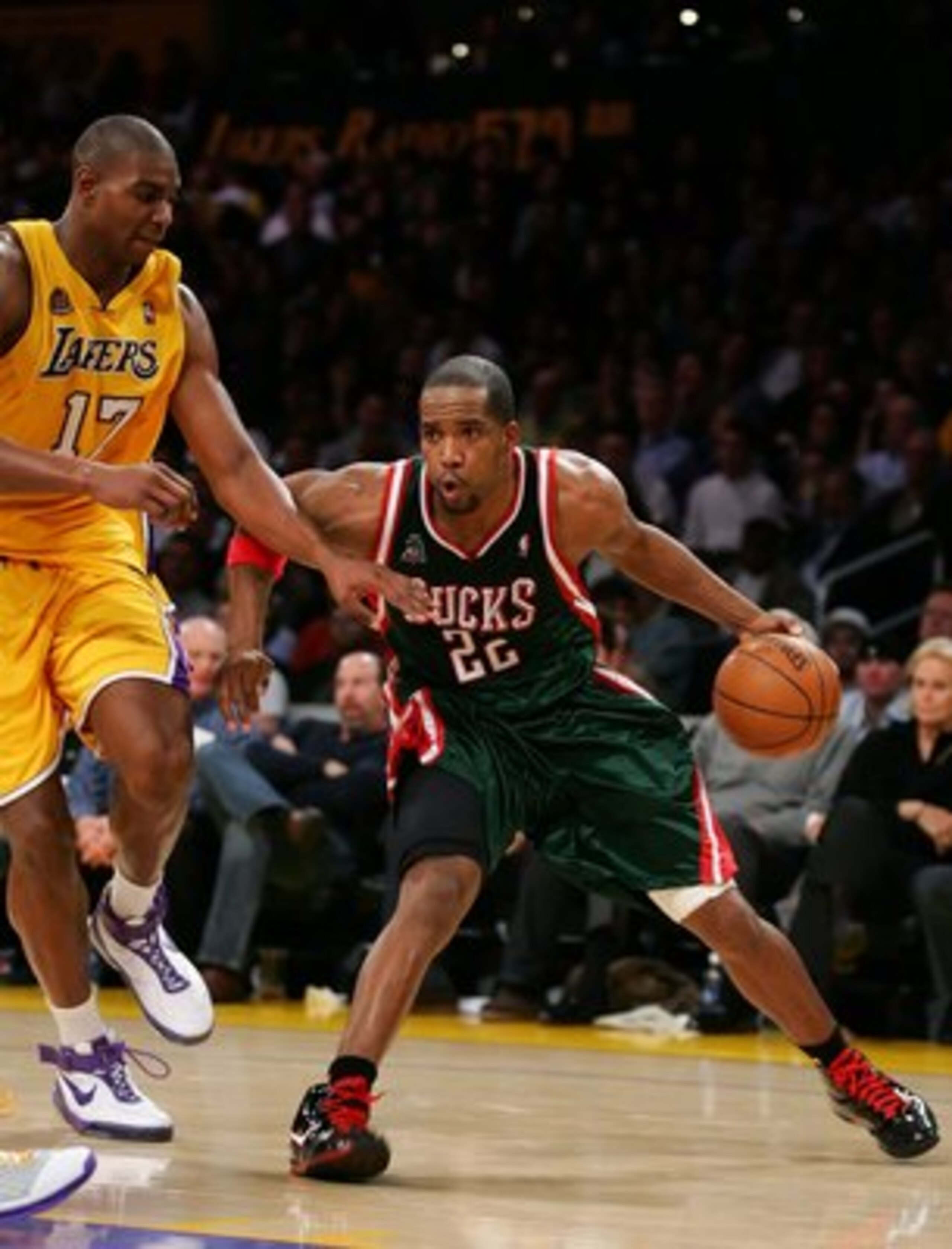 LOS ANGELES, CA - JANUARY 11: Michael Redd #22 of the Milwaukee Bucks drives against Andrew Bynum #17 of the Los Angeles Lakers at Staples Center on January 11, 2008 in Los Angeles, California. NOTE TO USER: User expressly acknowledges and agrees that, LOS ANGELES, CA - JANUARY 11: Michael Redd #22 of the Milwaukee Bucks drives against Andrew Bynum #17 of the Los Angeles Lakers at Staples Center on January 11, 2008 in Los Angeles, California. NOTE TO USER: User expressly acknowledges and agrees that,