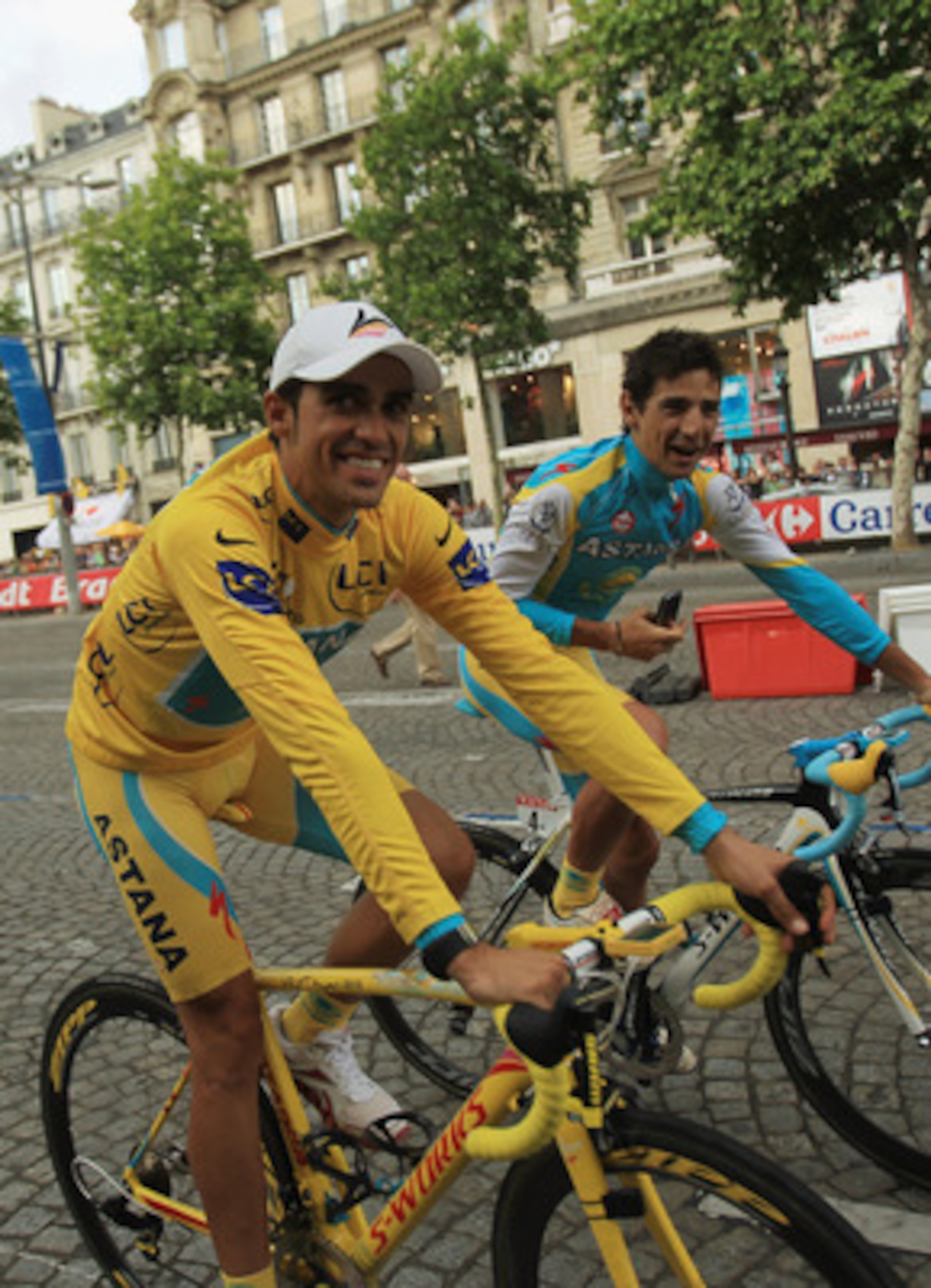 PARIS - JULY 25:  Alberto Contador of team Astana celebrates with teammate David De La Fuente after the twentieth and final stage of Le Tour de France 2010, from Longjumeau to the Champs-Elysees in Paris on July 25, 2010 in Paris, France.  (Photo by Spenc
