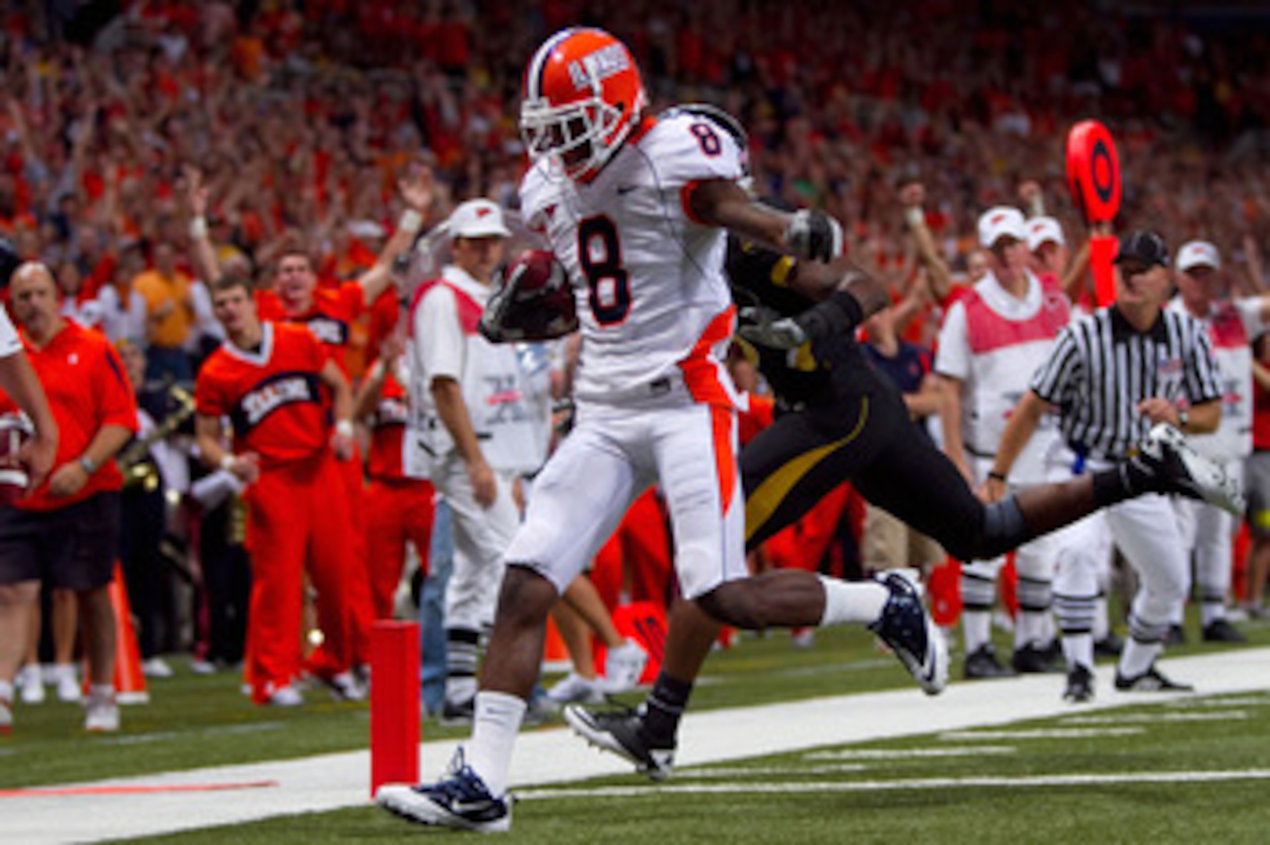 ST. LOUIS - SEPTEMBER 4: A.J. Jenkins #8 of the University of Illinois Fighting Illini scores a touchdown against the University of Missouri Tigers during the State Farm Arch Rivalry game on September 4, 2010 at the Edward Jones Dome in St. Louis, Missour