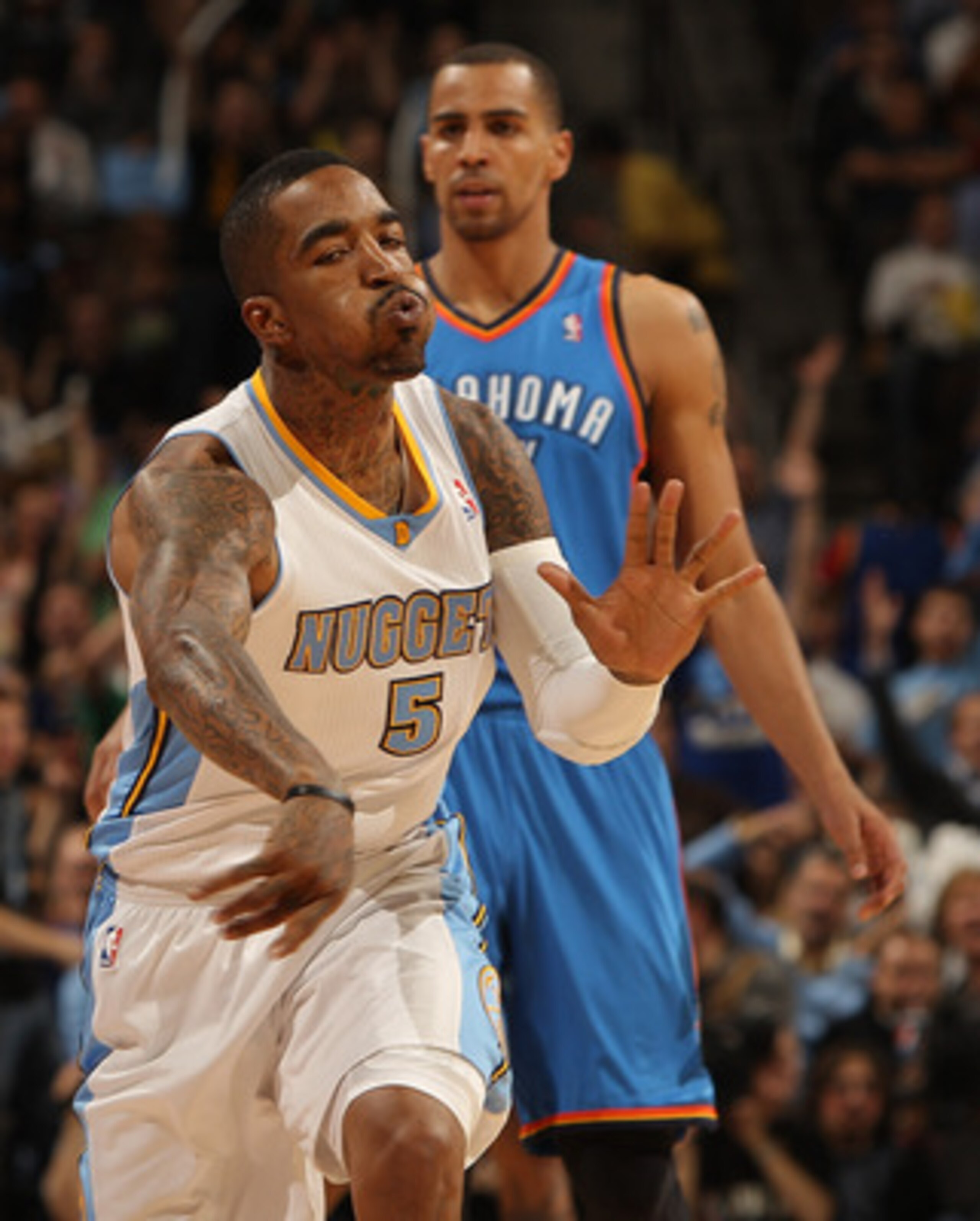 DENVER, CO - APRIL 25:  J.R. Smith #5 of the Denver Nuggets celebrates after hitting a three point basket against the Oklahoma City Thunder in Game Four of the Western Conference Quarterfinals in the 2011 NBA Playoffs at Pepsi Center on April 25, 2011 in 
