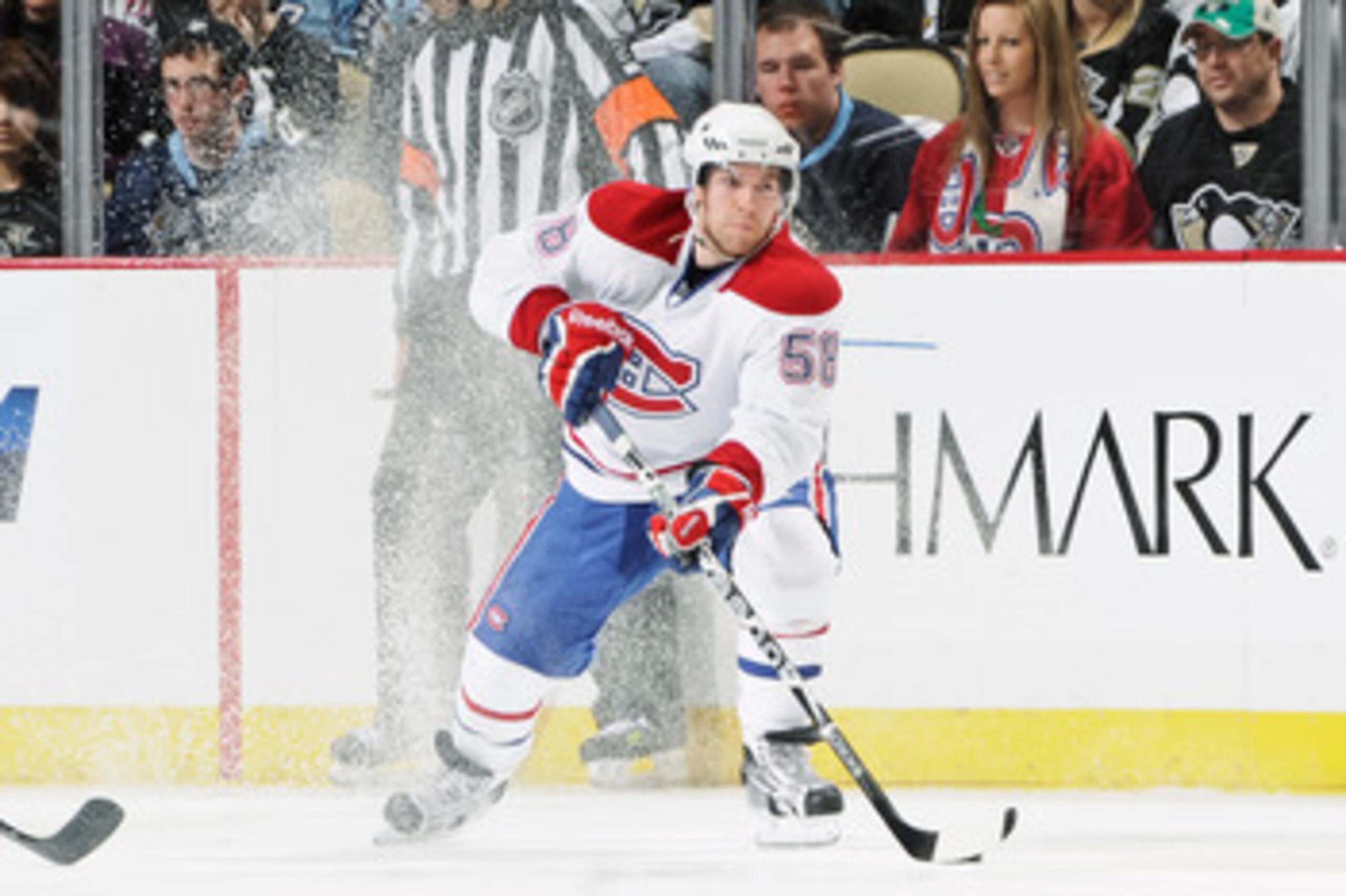 PITTSBURGH, PA - MARCH 12:  David Desharnais #58 of the Montreal Canadiens skates with the puck against the Pittsburgh Penguins on March 12, 2011 at CONSOL Energy Center in Pittsburgh, Pennsylvania.  (Photo by Jamie Sabau/Getty Images)