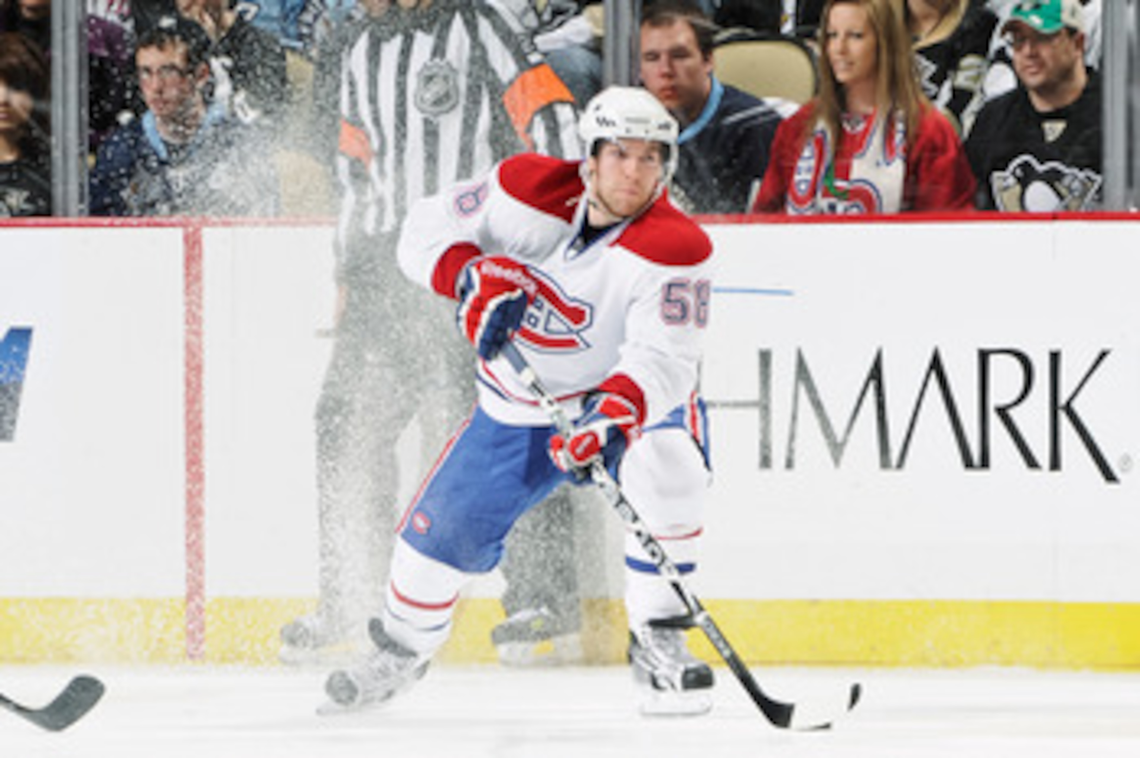 PITTSBURGH, PA - MARCH 12:  David Desharnais #58 of the Montreal Canadiens skates with the puck against the Pittsburgh Penguins on March 12, 2011 at CONSOL Energy Center in Pittsburgh, Pennsylvania.  (Photo by Jamie Sabau/Getty Images)