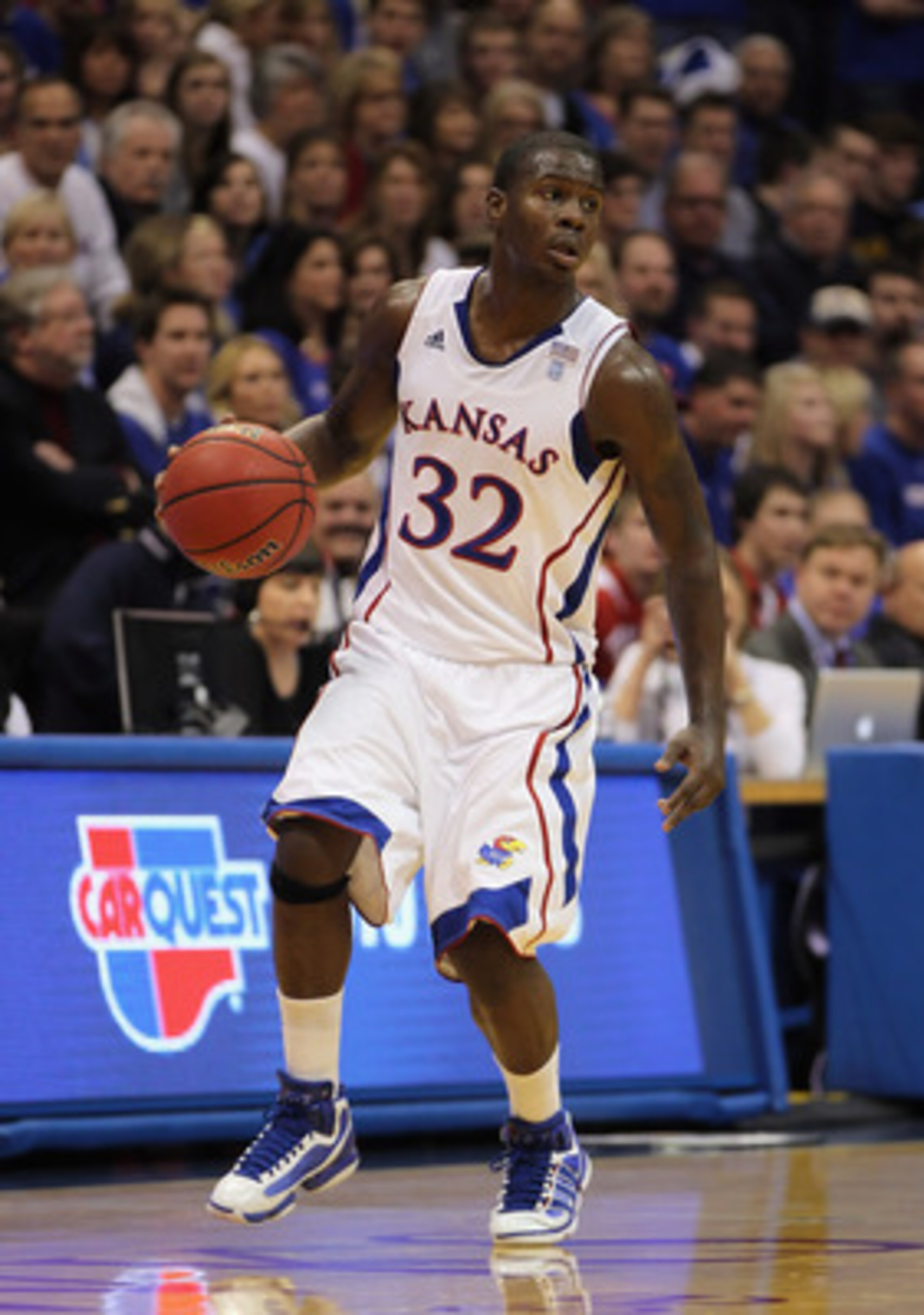 LAWRENCE, KS - DECEMBER 29:  Josh Selby #32 of the Kansas Jayhawks in action during the game against the University of Texas Arlington Mavericks on December 29, 2010 at Allen Fieldhouse in Lawrence, Kansas.  (Photo by Jamie Squire/Getty Images)