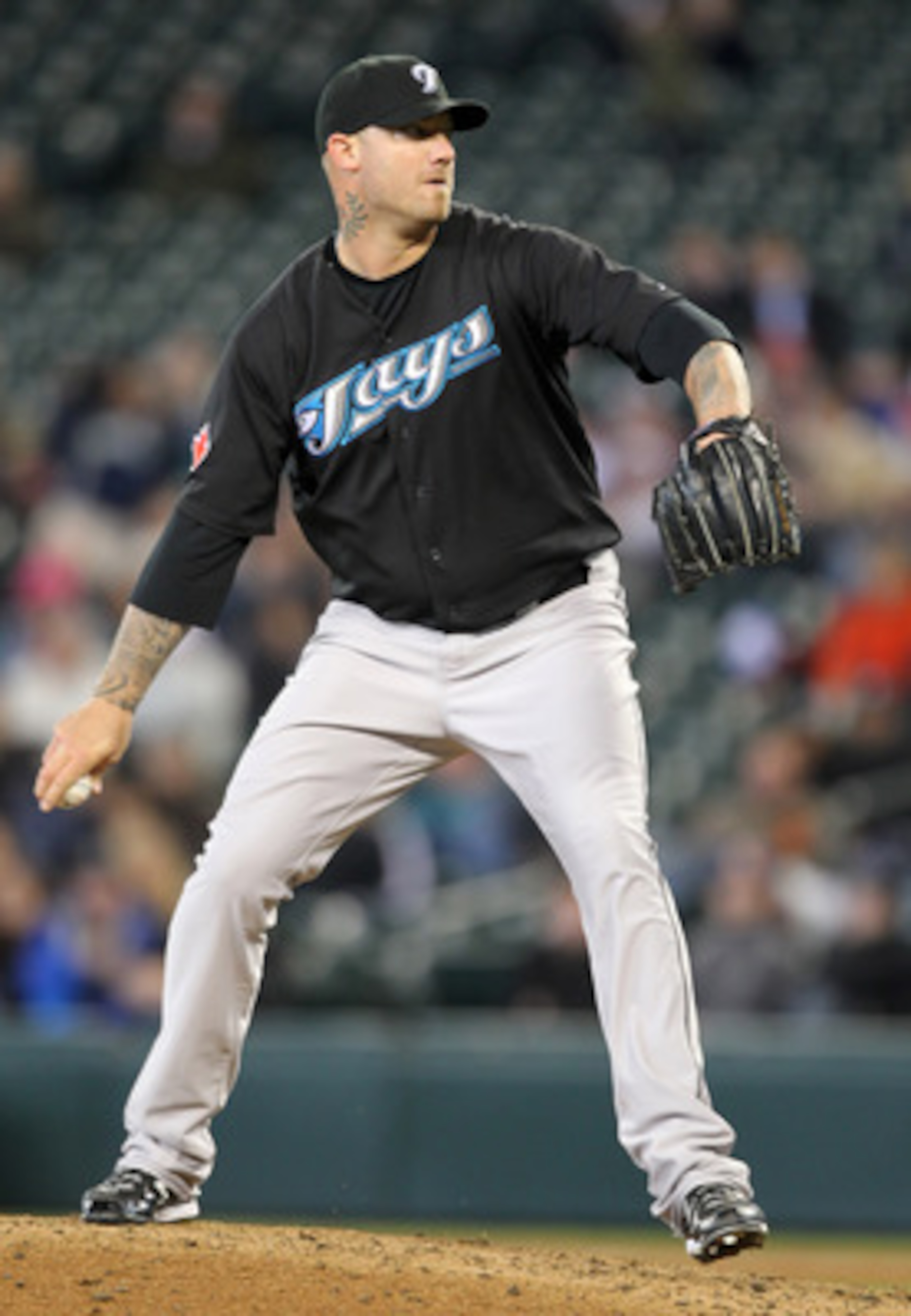 SEATTLE, WA - APRIL 13:  Relief pitcher Jon Rauch #60 of the Toronto Blue Jays pitches against the Seattle Mariners at Safeco Field on April 13, 2011 in Seattle, Washington. (Photo by Otto Greule Jr/Getty Images)