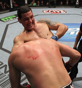 SYDNEY, AUSTRALIA - FEBRUARY 27: Octagon girl Brittney Palmer signals the start of round two at UFC 127 at Acer Arena on February 27, 2011 in Sydney, Australia.  (Photo by Mark Kolbe/Getty Images)