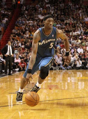 MIAMI, FL - FEBRUARY 25:  Josh Howard #5 of the  Washington Wizards drives against the Miami Heat  at American Airlines Arena on February 25, 2011 in Miami, Florida. NOTE TO USER: User expressly acknowledges and agrees that, by downloading and/or using th