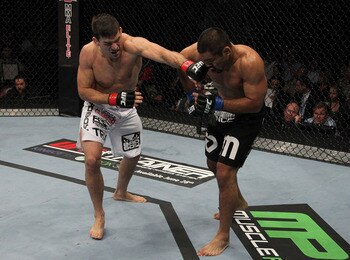 SYDNEY, AUSTRALIA - FEBRUARY 27: Octagon girl Brittney Palmer signals the start of round two at UFC 127 at Acer Arena on February 27, 2011 in Sydney, Australia.  (Photo by Mark Kolbe/Getty Images)