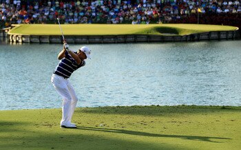 PONTE VEDRA BEACH, FL - MAY 15:  Nick Watney hits his tee shot on the 17th hole during the final round of THE PLAYERS Championship held at THE PLAYERS Stadium course at TPC Sawgrass on May 15, 2011 in Ponte Vedra Beach, Florida.  (Photo by Streeter Lecka/