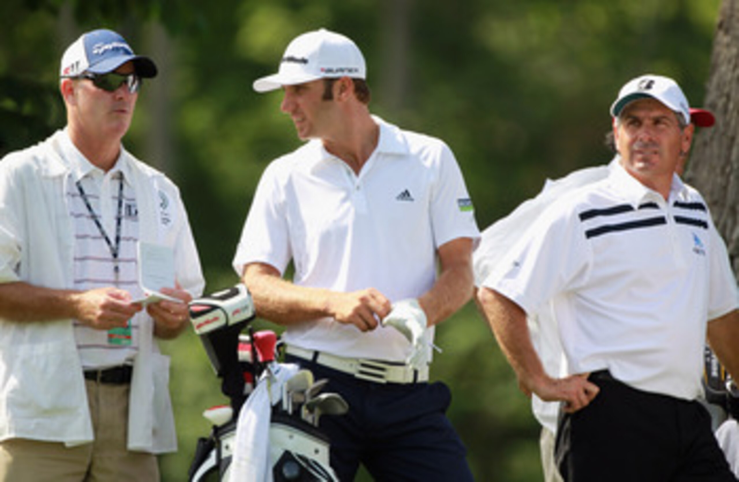 DUBLIN, OH - JUNE 02: Fred Couples (R) waits with Dustin Johnson (C) and his caddie Joe Lacava (L) on the 14th hole during the first round of the Memorial Tournament presented by Nationwide Insurance at the Muirfield Village Golf Club on June 2, 2011 in DUBLIN, OH - JUNE 02: Fred Couples (R) waits with Dustin Johnson (C) and his caddie Joe Lacava (L) on the 14th hole during the first round of the Memorial Tournament presented by Nationwide Insurance at the Muirfield Village Golf Club on June 2, 2011 in
