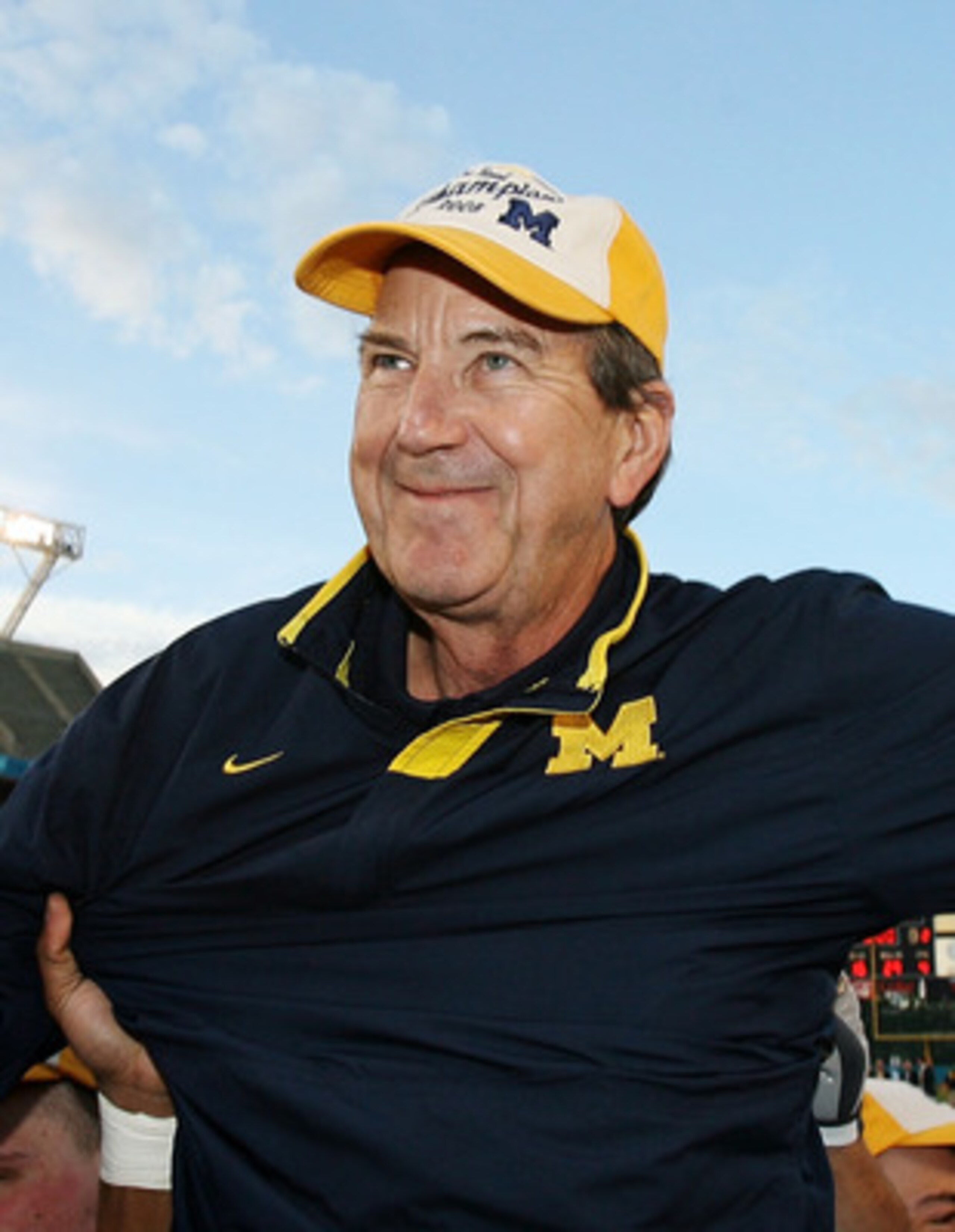 ORLANDO, FL - JANUARY 01: Head coach Lloyd Carr of the Michigan Wolverines is carried off the field after ending his coaching career with a victory over the Florida Gators in the Capital One Bowl at Florida Citrus Bowl on January 1, 2008 in Orlando, Flor ORLANDO, FL - JANUARY 01: Head coach Lloyd Carr of the Michigan Wolverines is carried off the field after ending his coaching career with a victory over the Florida Gators in the Capital One Bowl at Florida Citrus Bowl on January 1, 2008 in Orlando, Flor