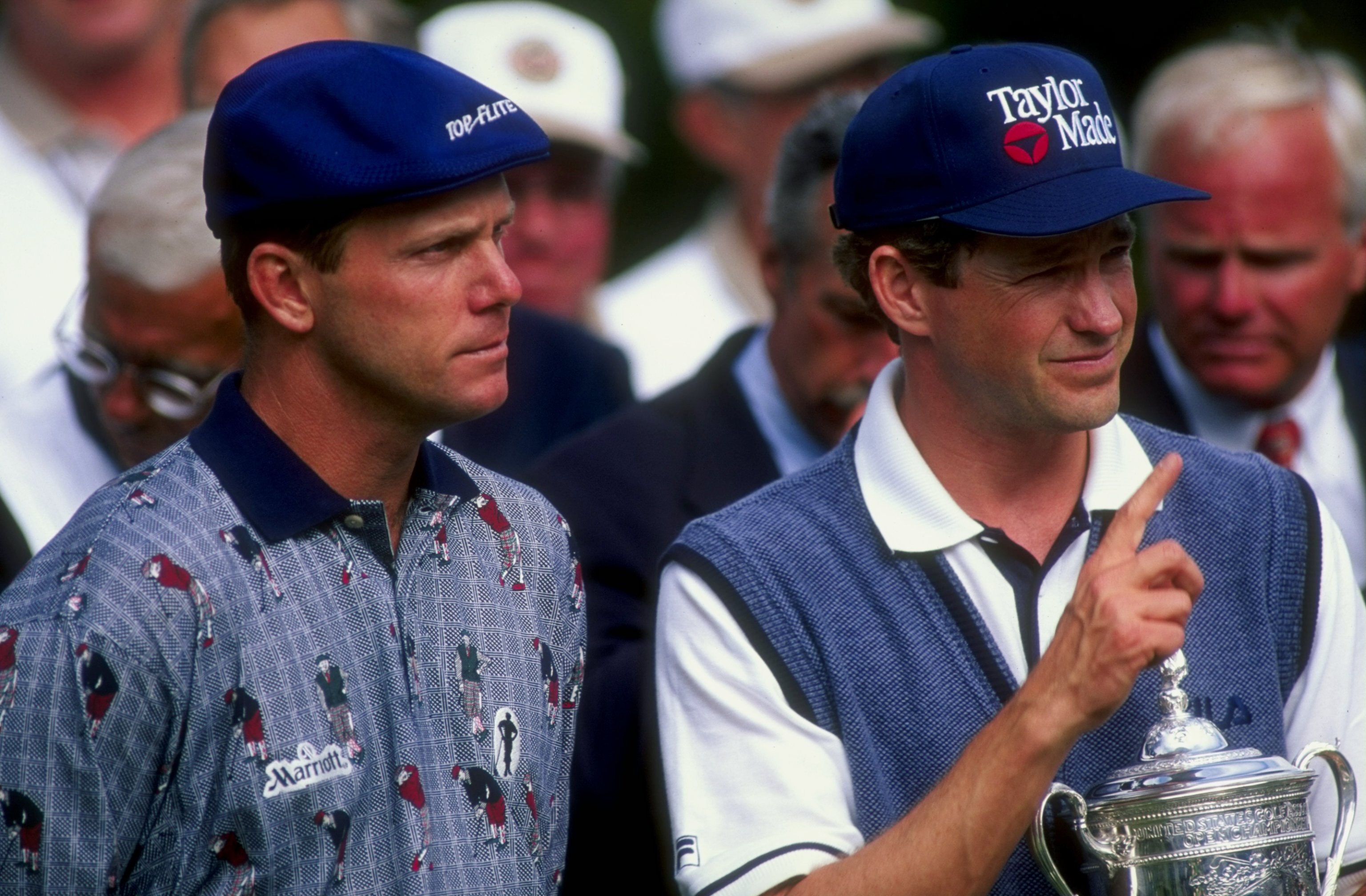 21 Jun 1998:  Lee Janzen of the USA poses with the trophy as Payne Stewart of the USA looks on.  Janzen won the 1998 U.S. Open Championships on the 6,797-yard, par-70 Lake Course at The Olympic Club in San Francisco, California. Mandatory Credit: Craig Jo