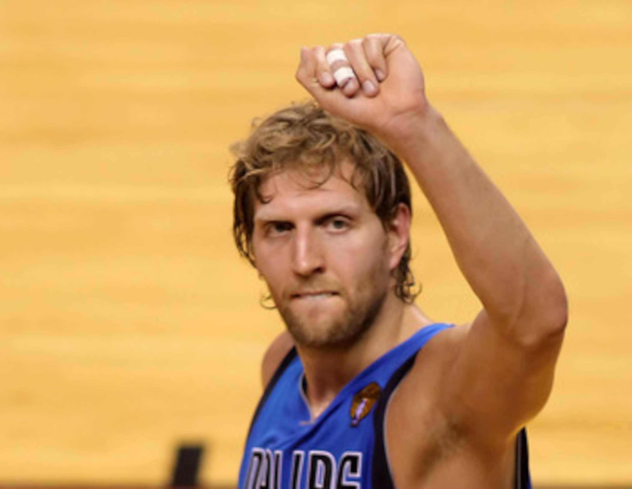 MIAMI, FL - JUNE 12:  Dirk Nowitzki #41 of the Dallas Mavericks celebrates against the Miami Heat in Game Six of the 2011 NBA Finals at American Airlines Arena on June 12, 2011 in Miami, Florida. The Mavericks won 105-95. NOTE TO USER: User expressly ackn