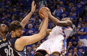 OKLAHOMA CITY, OK - MAY 15:  Forward Kevin Durant #35 of the Oklahoma City Thunder is fouled by Marc Gasol #33 of the Memphis Grizzlies in Game Seven of the Western Conference Semifinals in the 2011 NBA Playoffs on May 15, 2011 at Oklahoma City Arena in O