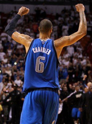 MIAMI, FL - JUNE 12:  Tyson Chandler #6 of the Dallas Mavericks celebrates after the Mavricks won 105-95 against the Miami Heat in Game Six of the 2011 NBA Finals at American Airlines Arena on June 12, 2011 in Miami, Florida. NOTE TO USER: User expressly 