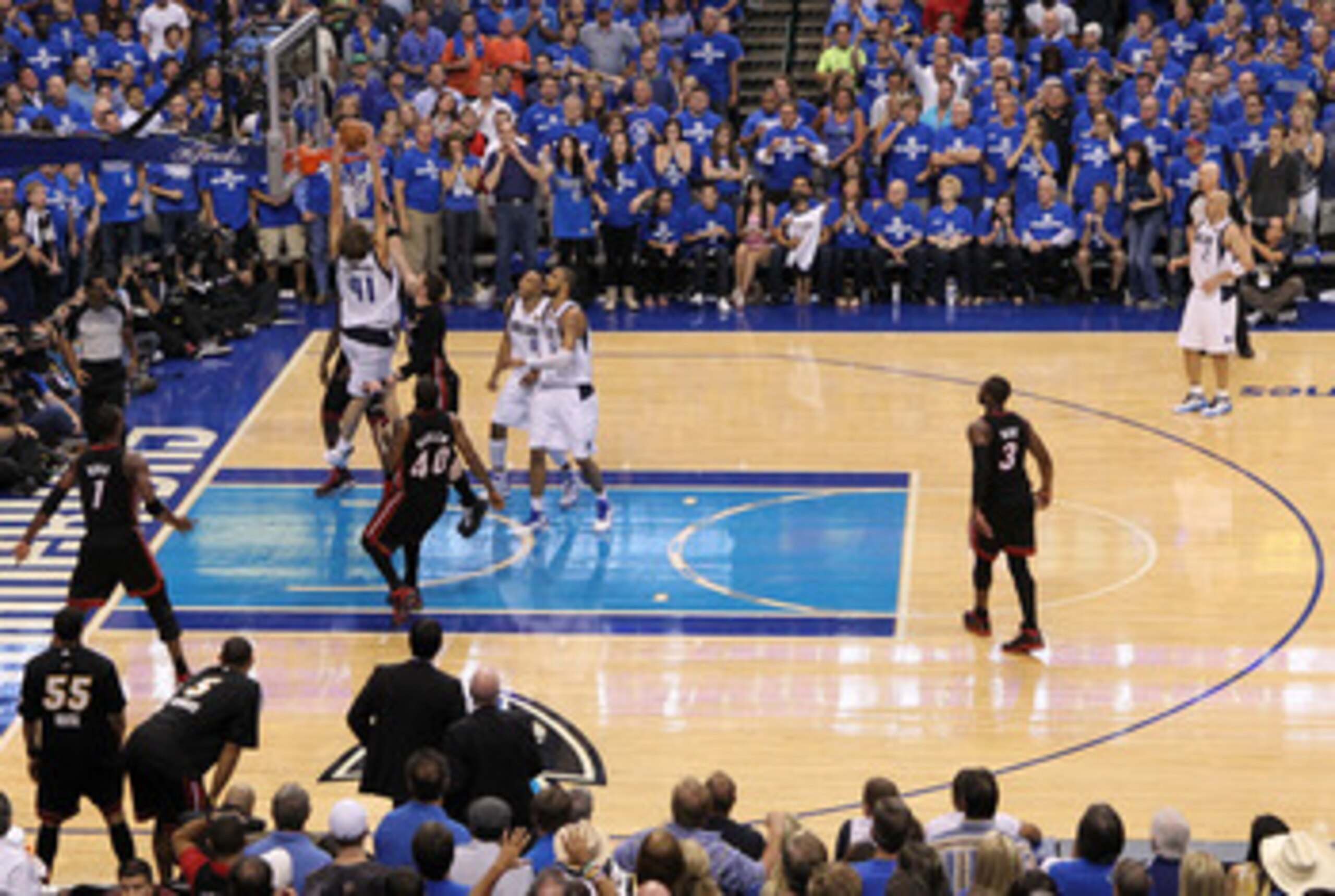 DALLAS, TX - JUNE 09:  Dirk Nowitzki #41 of the Dallas Mavericks dunks against Mike Miller #13 of the Miami Heat late in the fourth quarter in Game Five of the 2011 NBA Finals at American Airlines Center on June 9, 2011 in Dallas, Texas.  NOTE TO USER: Us