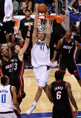DALLAS, TX - JUNE 09: Dirk Nowitzki #41 of the Dallas Mavericks dunks against Mike Miller #13 and LeBron James #6 of the Miami Heat late in the fourth quarter in Game Five of the 2011 NBA Finals at American Airlines Center on June 9, 2011 in Dallas, Texa DALLAS, TX - JUNE 09: Dirk Nowitzki #41 of the Dallas Mavericks dunks against Mike Miller #13 and LeBron James #6 of the Miami Heat late in the fourth quarter in Game Five of the 2011 NBA Finals at American Airlines Center on June 9, 2011 in Dallas, Texa