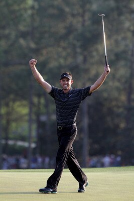AUGUSTA, GA - APRIL 10:  Charl Schwartzel of South Africa celebrates his birdie on the 18th green and winning the Masters during the final round of the 2011 Masters Tournament at Augusta National Golf Club on April 10, 2011 in Augusta, Georgia.  (Photo by