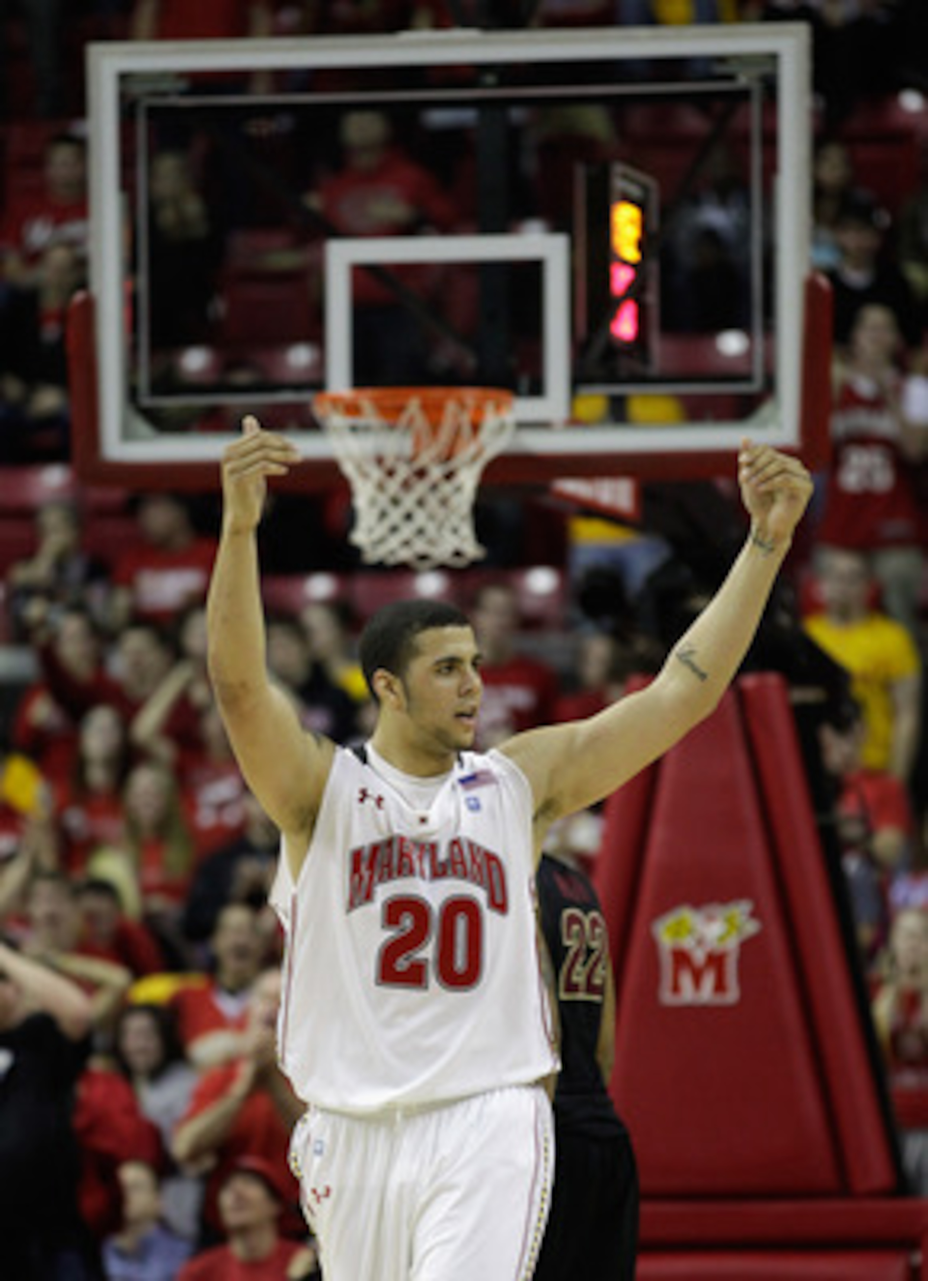 COLLEGE PARK, MD - FEBRUARY 23: Jordan Williams #20 of the Maryland Terrapins celebrates against the Florida State Seminoles at the Comast Center on February 23, 2011 in College Park, Maryland.  (Photo by Rob Carr/Getty Images)