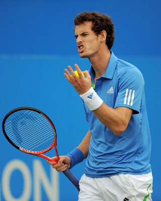 LONDON, ENGLAND - JUNE 11:  Andy Murray of Great Britain reacts to a play during his Men's Singles semi final match against Andy Roddick of the United States on day six of the AEGON Championships at Queens Club on June 11, 2011 in London, England.  (Photo