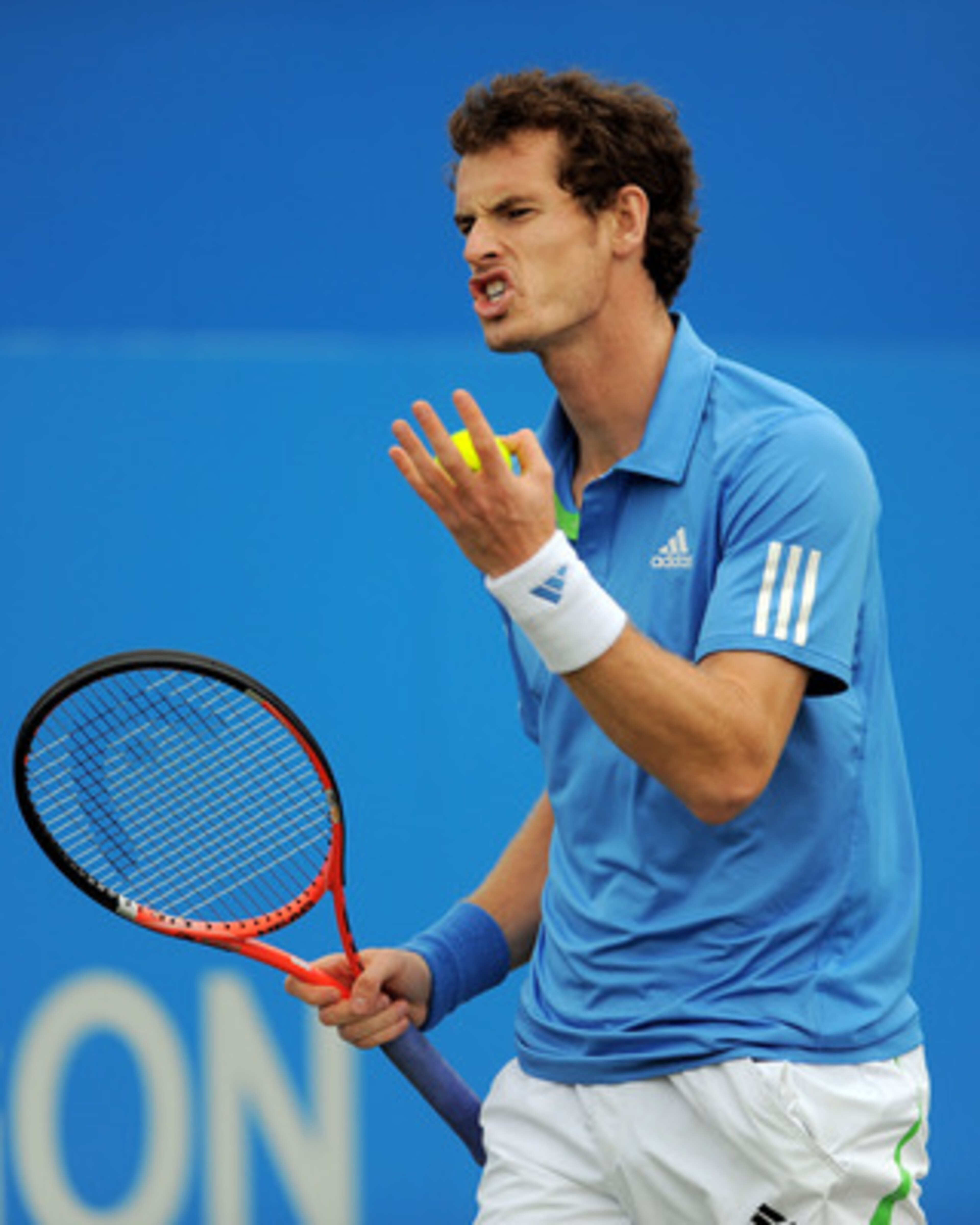 LONDON, ENGLAND - JUNE 11:  Andy Murray of Great Britain reacts to a play during his Men's Singles semi final match against Andy Roddick of the United States on day six of the AEGON Championships at Queens Club on June 11, 2011 in London, England.  (Photo