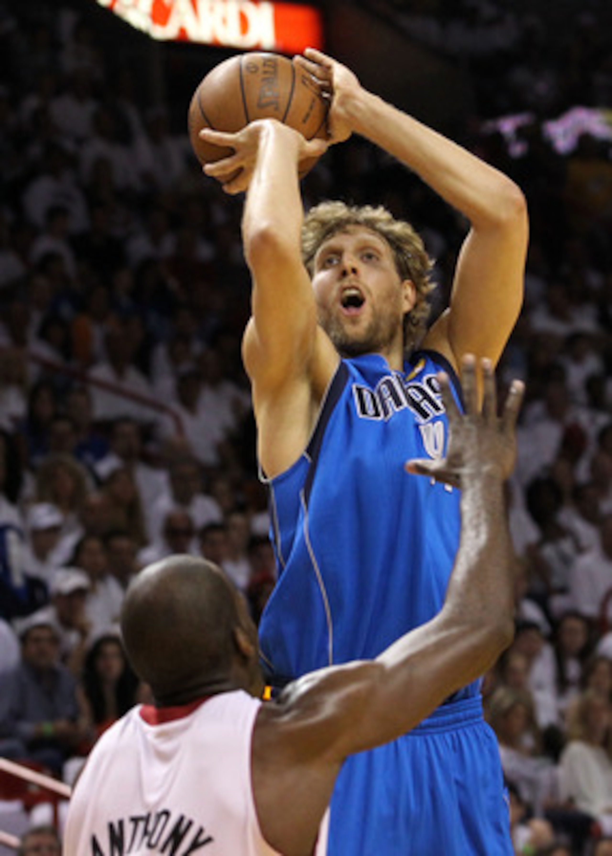MIAMI, FL - JUNE 12:  Dirk Nowitzki #41 of the Dallas Mavericks attempts a shot against Joel Anthony #50 of the Miami Heat in the first quarter of Game Six of the 2011 NBA Finals at American Airlines Arena on June 12, 2011 in Miami, Florida. NOTE TO USER: