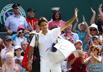 LONDON, ENGLAND - JUNE 30:  Roger Federer of Switzerland waves as he exits after losing his Quarter Final match against Tomas Berdych of Czech Republic on Day Nine of the Wimbledon Lawn Tennis Championships at the All England Lawn Tennis and Croquet Club 
