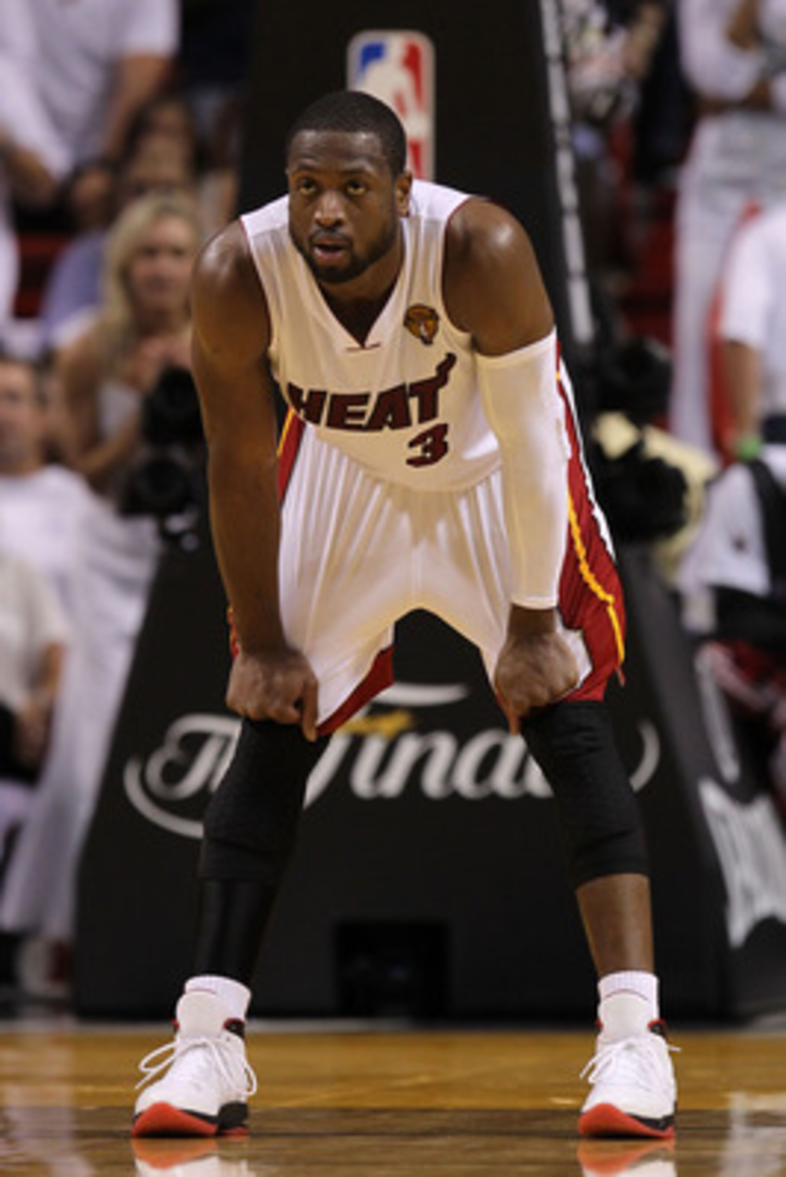 MIAMI, FL - JUNE 12:  Dwyane Wade #3 of the Miami Heat looks on in the fourth quarter against the Dallas Mavericks in Game Six of the 2011 NBA Finals at American Airlines Arena on June 12, 2011 in Miami, Florida. NOTE TO USER: User expressly acknowledges 