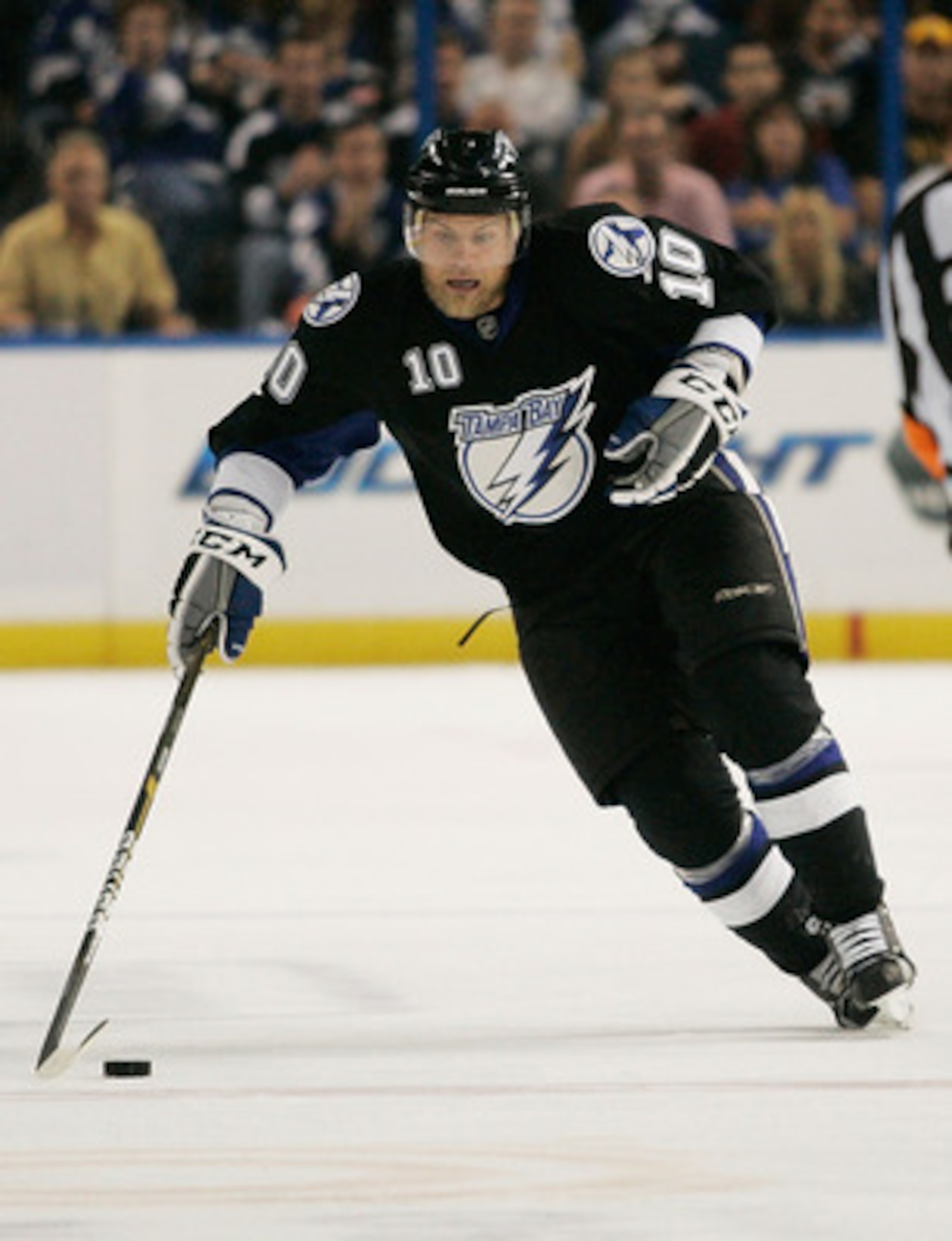 TAMPA, FL - MAY 21:  Sean Bergenheim #10 of the Tampa Bay Lightning controls the puck in Game Four of the Eastern Conference Finals against the Boston Bruins during the 2011 NHL Stanley Cup Playoffs at St Pete Times Forum on May 21, 2011 in Tampa, Florida