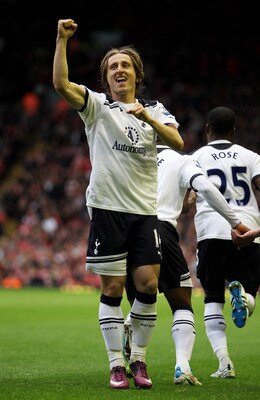 LIVERPOOL, ENGLAND - MAY 15:  Luka Modric of Spurs celebrates after scoring his team's second goal from the penalty spot during the Barclays Premier League match between Liverpool and Tottenham Hotspur at Anfield on May 15, 2011 in Liverpool, England.  (P