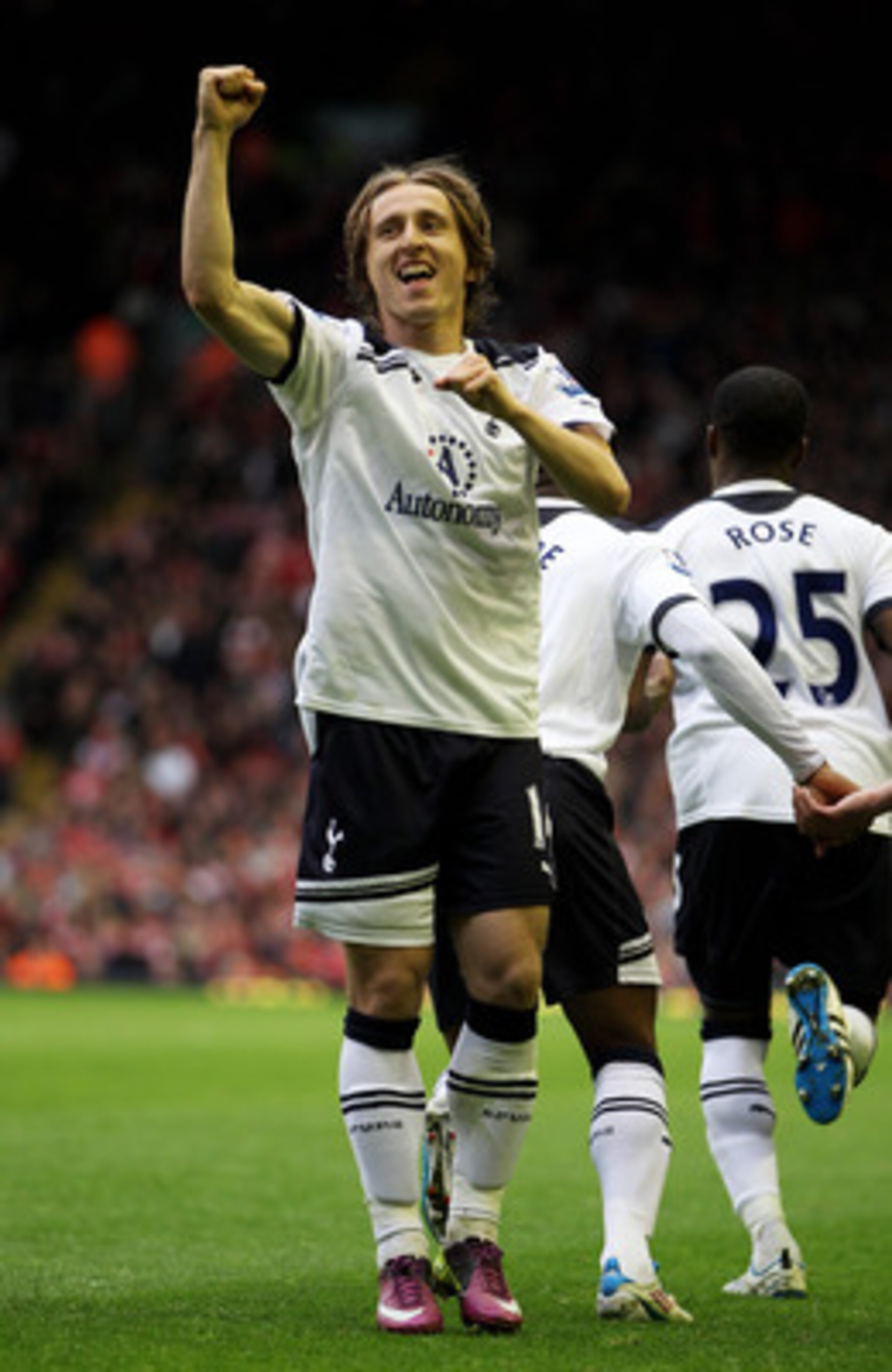 LIVERPOOL, ENGLAND - MAY 15:  Luka Modric of Spurs celebrates after scoring his team's second goal from the penalty spot during the Barclays Premier League match between Liverpool and Tottenham Hotspur at Anfield on May 15, 2011 in Liverpool, England.  (P
