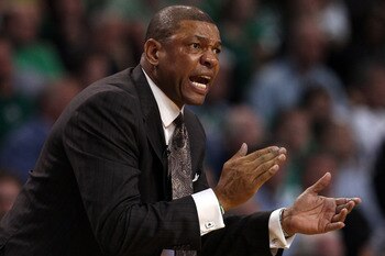 BOSTON, MA - MAY 09:  Head coach Doc Rivers of the Boston Celtics encourages his players in overtime against the Miami Heat in Game Four of the Eastern Conference Semifinals in the 2011 NBA Playoffs on May 9, 2011 at the TD Garden in Boston, Massachusetts