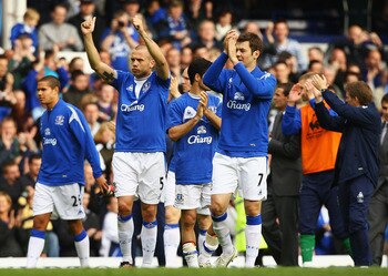 LIVERPOOL, ENGLAND - MAY 09:  John Heitinga and Diniyar Bilyaletdinov of Everton thank the supoorters after the Barclays Premier League match between Everton and Portsmouth at Goodison Park on May 9, 2010 in Liverpool, England.  (Photo by Matthew Lewis/Ge