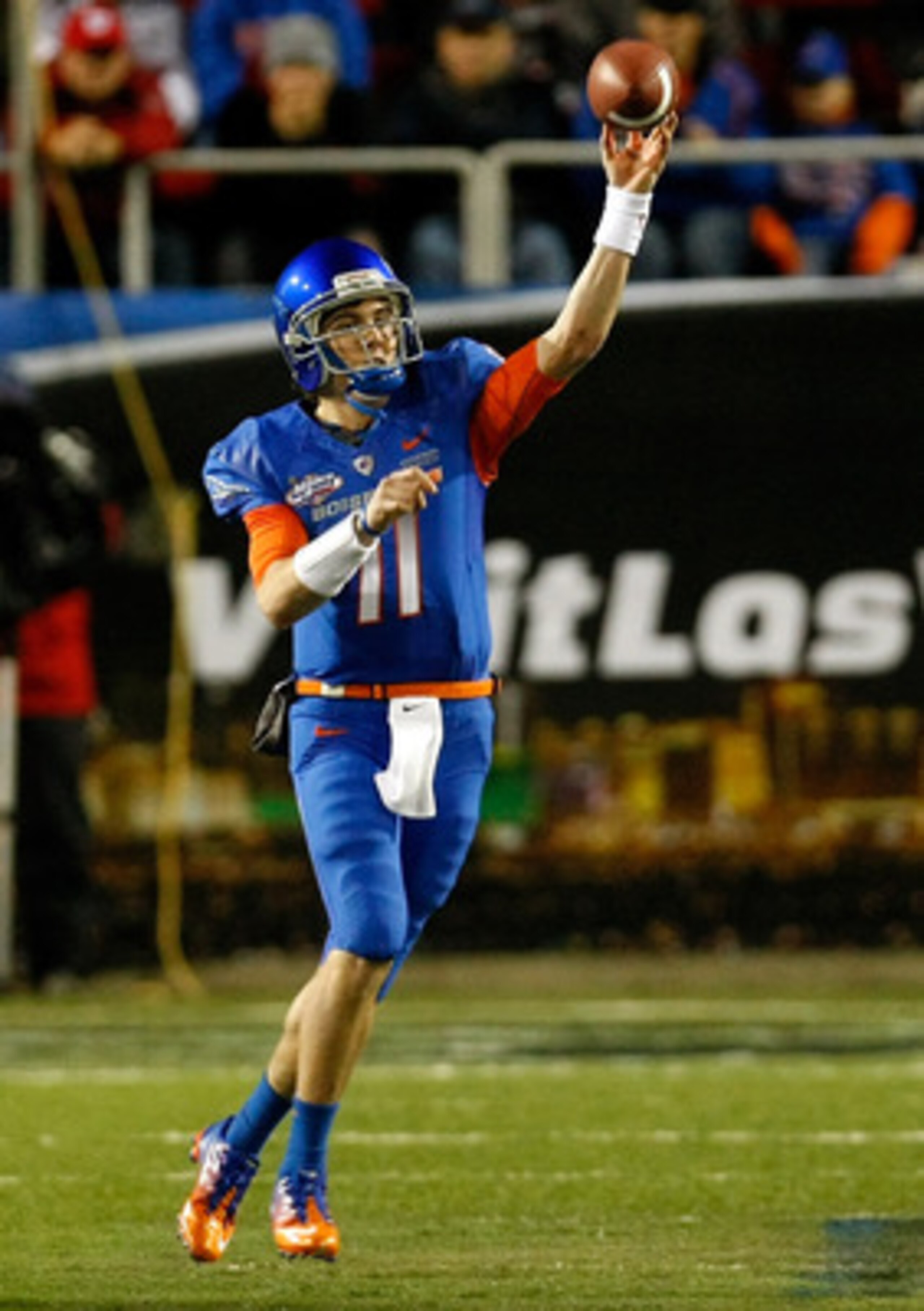 LAS VEGAS, NV - DECEMBER 22:  Quarterback Kellen Moore #11 of the Boise State Broncos throws for yardage against the Utah Utes during the MAACO Bowl Las Vegas at Sam Boyd Stadium December 22, 2010 in Las Vegas, Nevada. Boise State Won 26-3.  (Photo by Eth