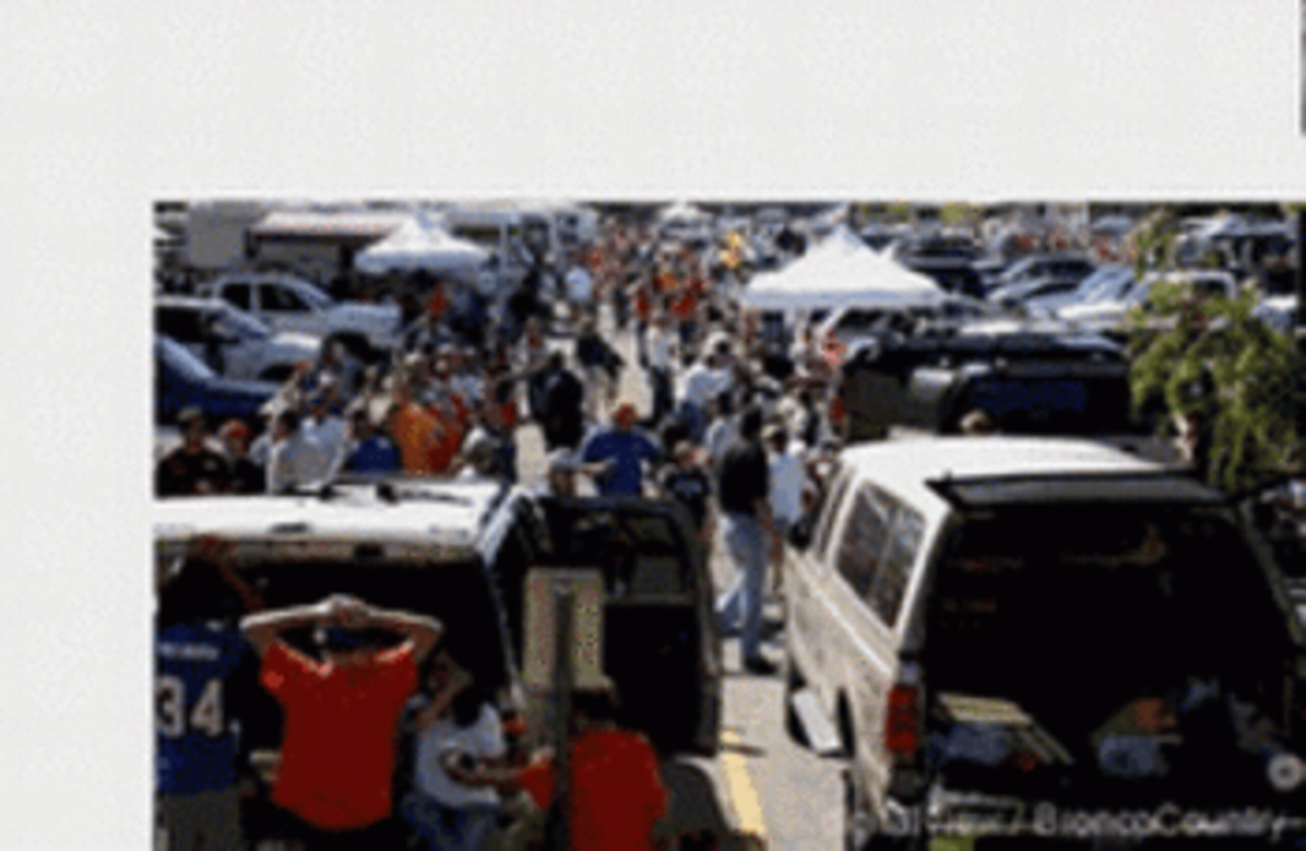 GLENDALE, AZ - JANUARY 04:  Boise State Broncos fans tailgate outside Universtity of Phoenix Stadium before the Tostitos Fiesta Bowl against the TCU Horned Frogs on January 4, 2010 in Glendale, Arizona.  (Photo by Christian Petersen/Getty Images)