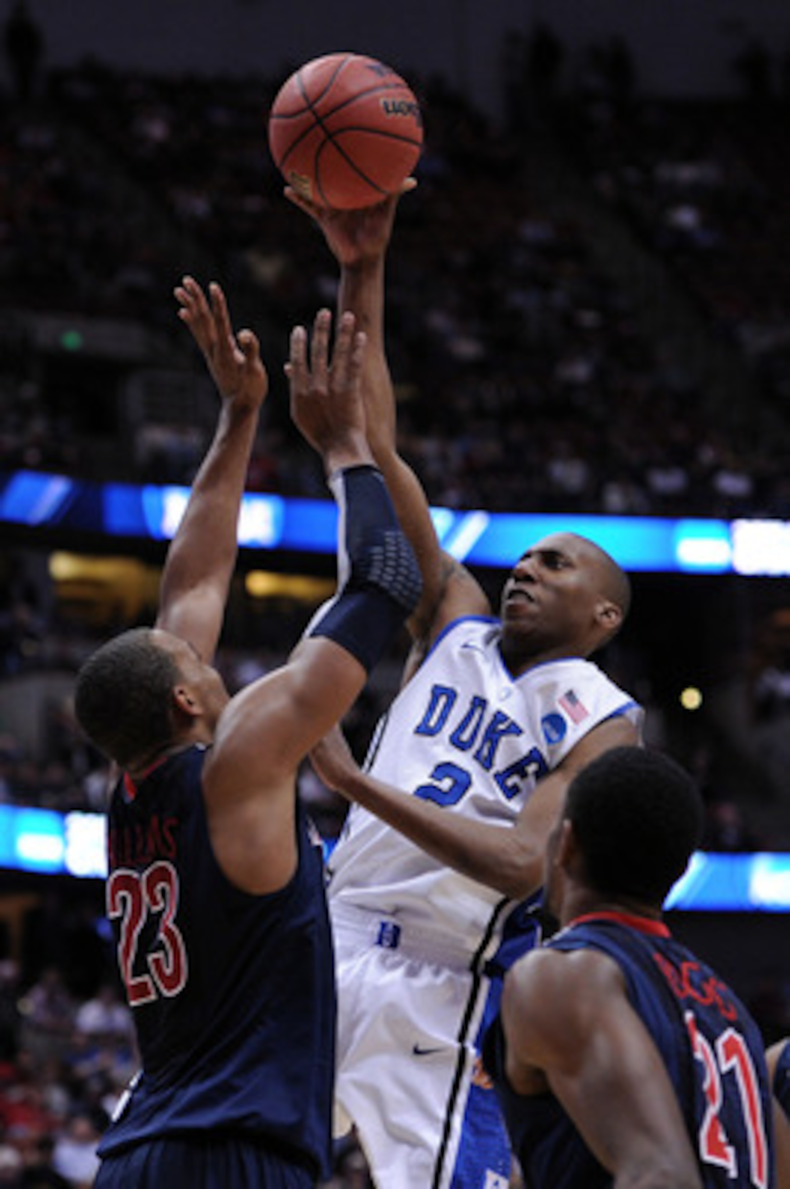 ANAHEIM, CA - MARCH 24: Nolan Smith #2 of the Duke Blue Devils shoot the ball over Derrick Williams #23 of the Arizona Wildcats during the west regional semifinal of the 2011 NCAA men's basketball tournament at the Honda Center on March 24, 2011 in Anahe ANAHEIM, CA - MARCH 24: Nolan Smith #2 of the Duke Blue Devils shoot the ball over Derrick Williams #23 of the Arizona Wildcats during the west regional semifinal of the 2011 NCAA men's basketball tournament at the Honda Center on March 24, 2011 in Anahe
