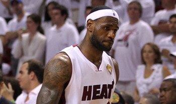 MIAMI, FL - JUNE 12:  LeBron James #6 of the Miami Heat looks on dejected against the Dallas Mavericks in Game Six of the 2011 NBA Finals at American Airlines Arena on June 12, 2011 in Miami, Florida. NOTE TO USER: User expressly acknowledges and agrees t