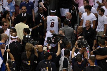 MIAMI, FL - JUNE 12:  LeBron James #6 of the Miami Heat walks off the court after the Dallas Mavericks won 105-95 in Game Six of the 2011 NBA Finals at American Airlines Arena on June 12, 2011 in Miami, Florida. NOTE TO USER: User expressly acknowledges a