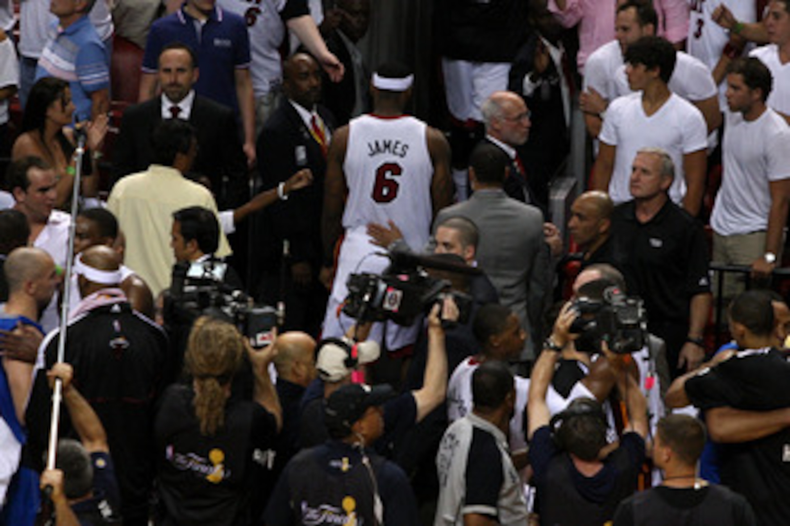 MIAMI, FL - JUNE 12:  LeBron James #6 of the Miami Heat walks off the court after the Dallas Mavericks won 105-95 in Game Six of the 2011 NBA Finals at American Airlines Arena on June 12, 2011 in Miami, Florida. NOTE TO USER: User expressly acknowledges a