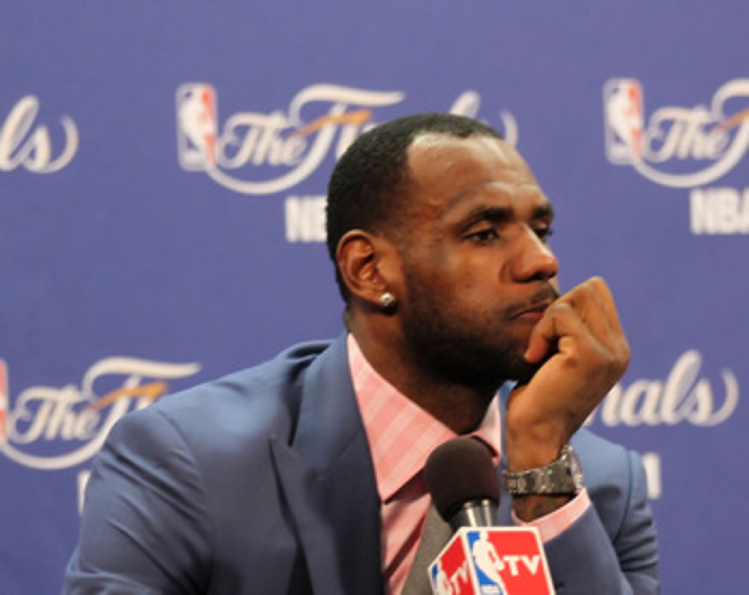 MIAMI, FL - JUNE 12:  LeBron James #6 of the Miami Heat answers questions after the Heat were defeated 105-95 by the Dallas Mavericks in Game Six of the 2011 NBA Finals at American Airlines Arena on June 12, 2011 in Miami, Florida. NOTE TO USER: User expr