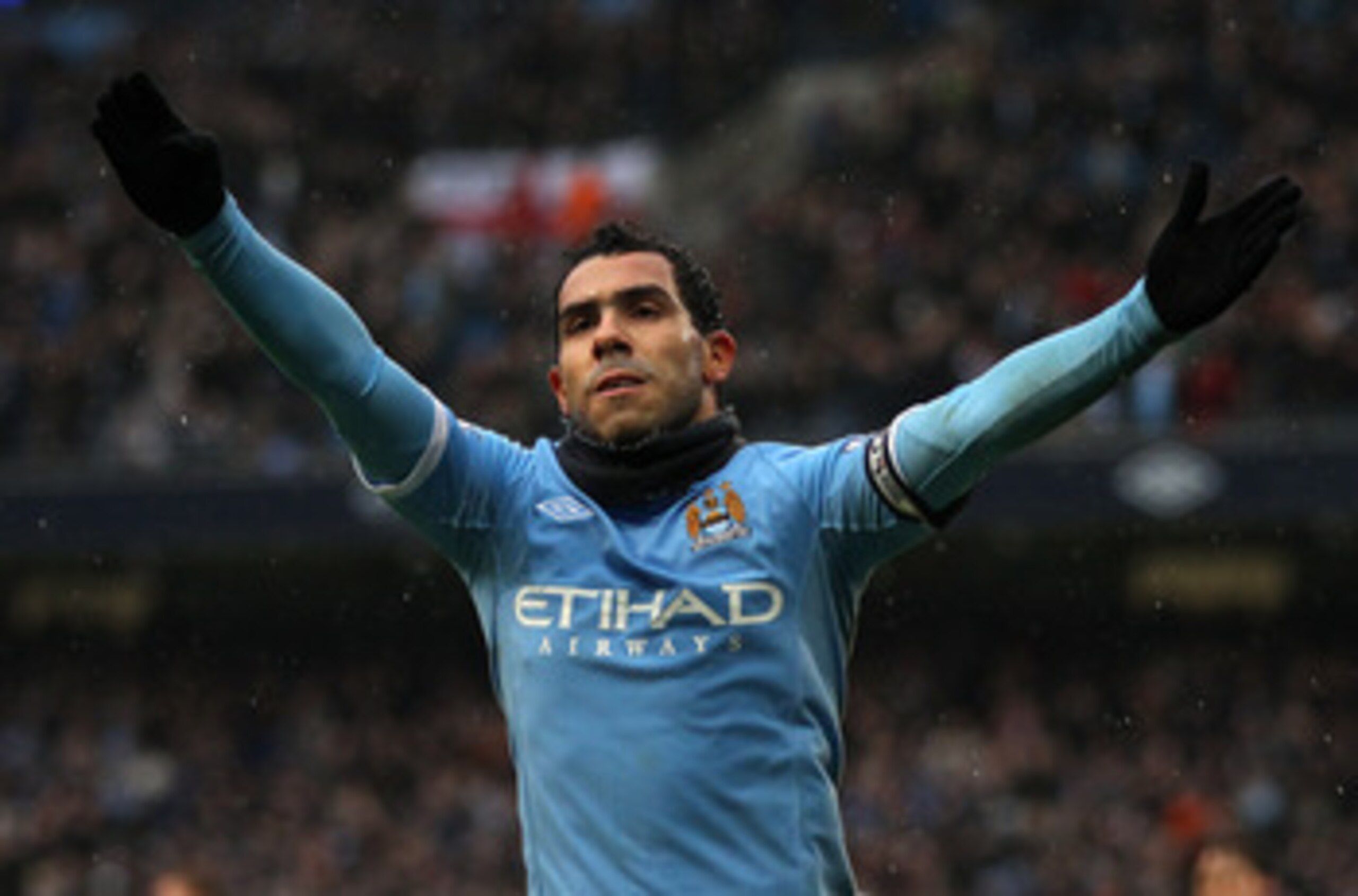MANCHESTER, ENGLAND - FEBRUARY 05:  Carlos Tevez of Manchester City celebrates after scoring his third goal during the Barclays Premier League match between Manchester City and West Bromwich Albion at the City of Manchester Stadium on February 5, 2011 in